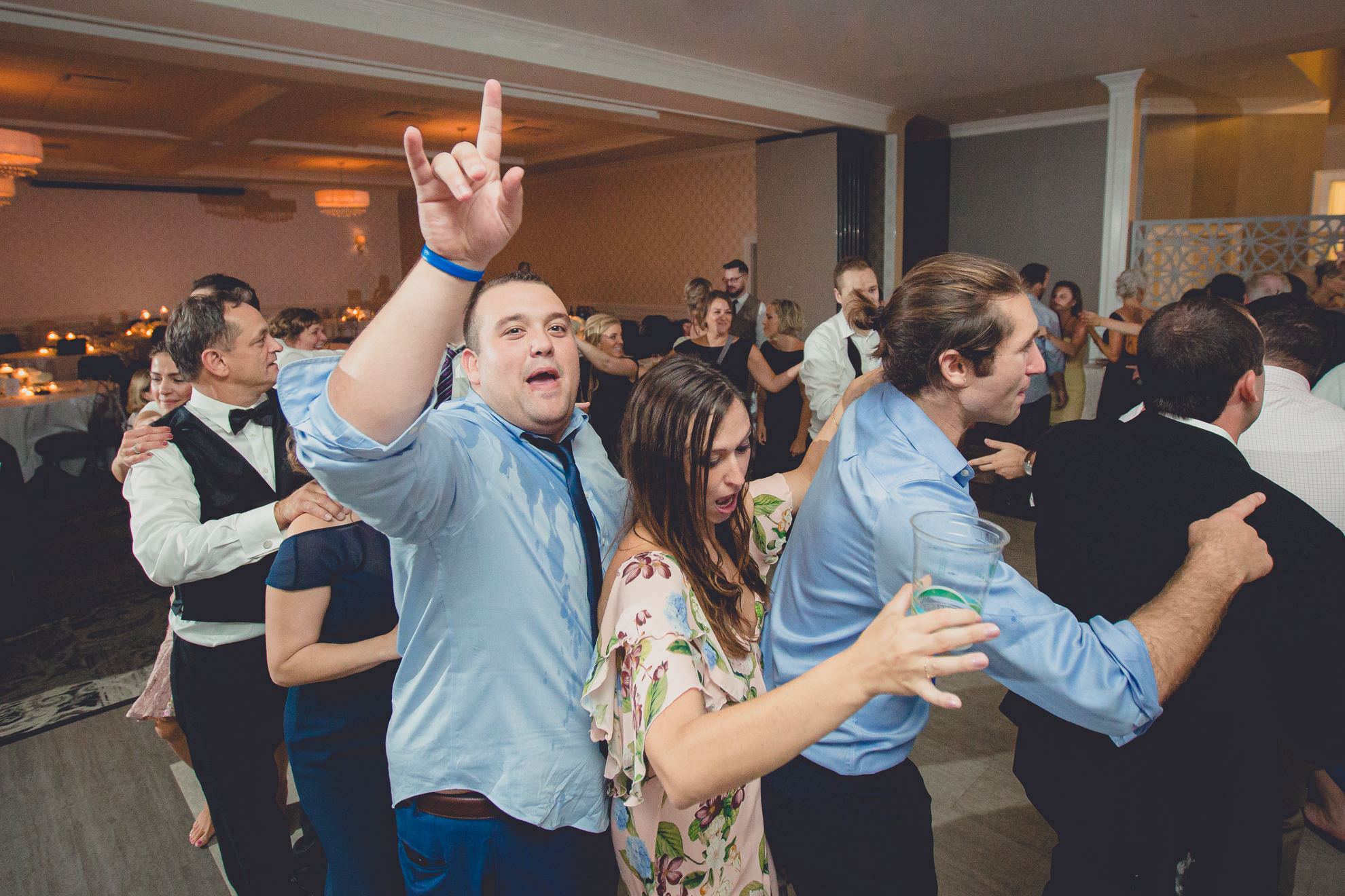 guests dance at wedding reception at Niagara Falls Country Club in Lewiston, NY