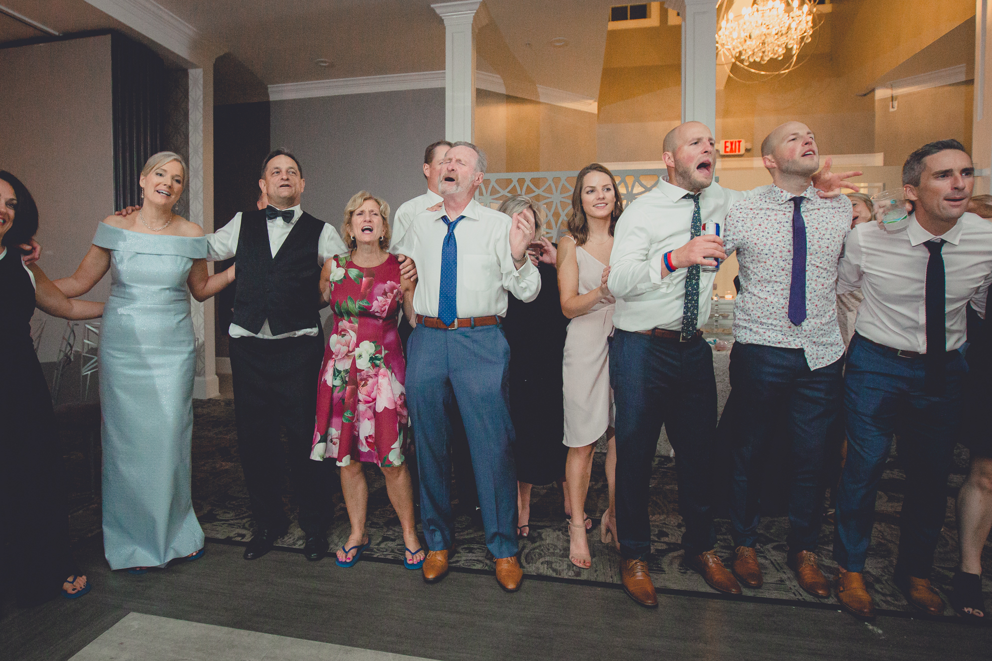 guests sing at wedding reception at Niagara Falls Country Club in Lewiston, NY