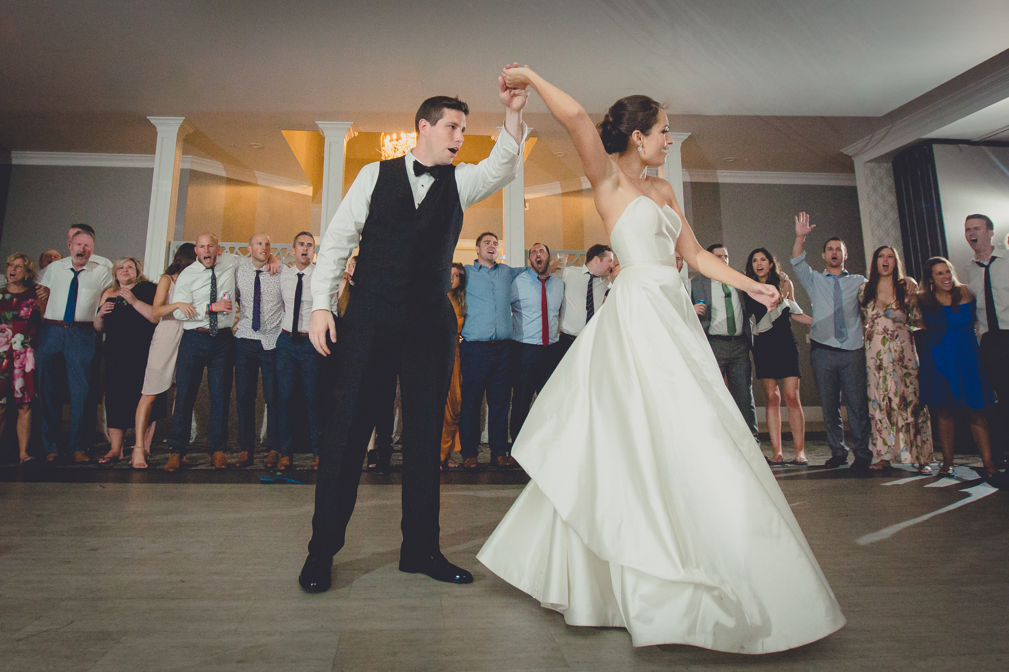 bride and groom dance at wedding reception at Niagara Falls Country Club in Lewiston, NY