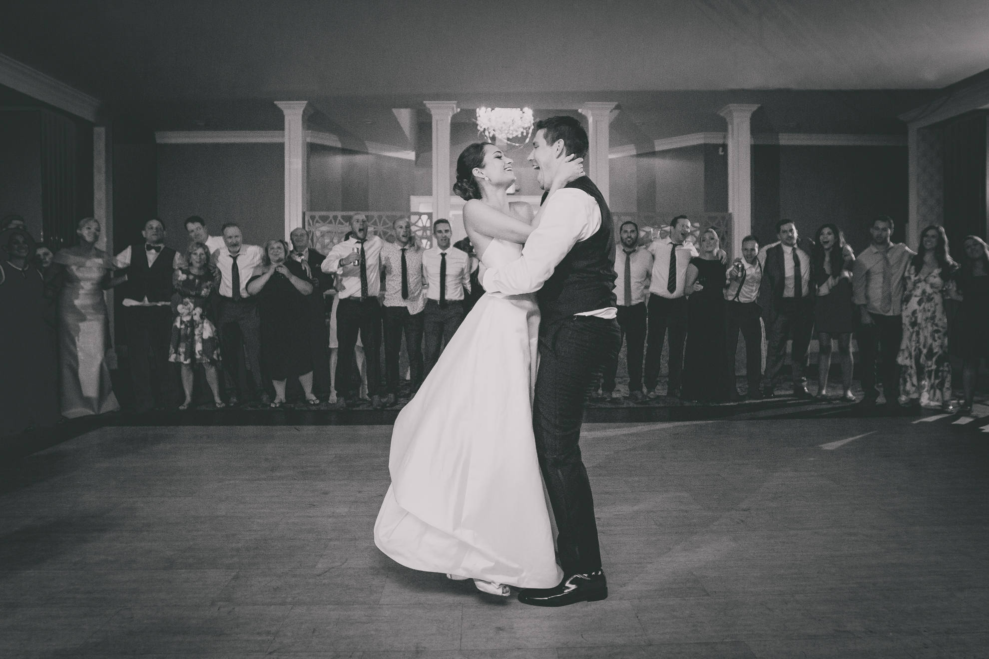 bride and groom dance at wedding reception at Niagara Falls Country Club in Lewiston, NY