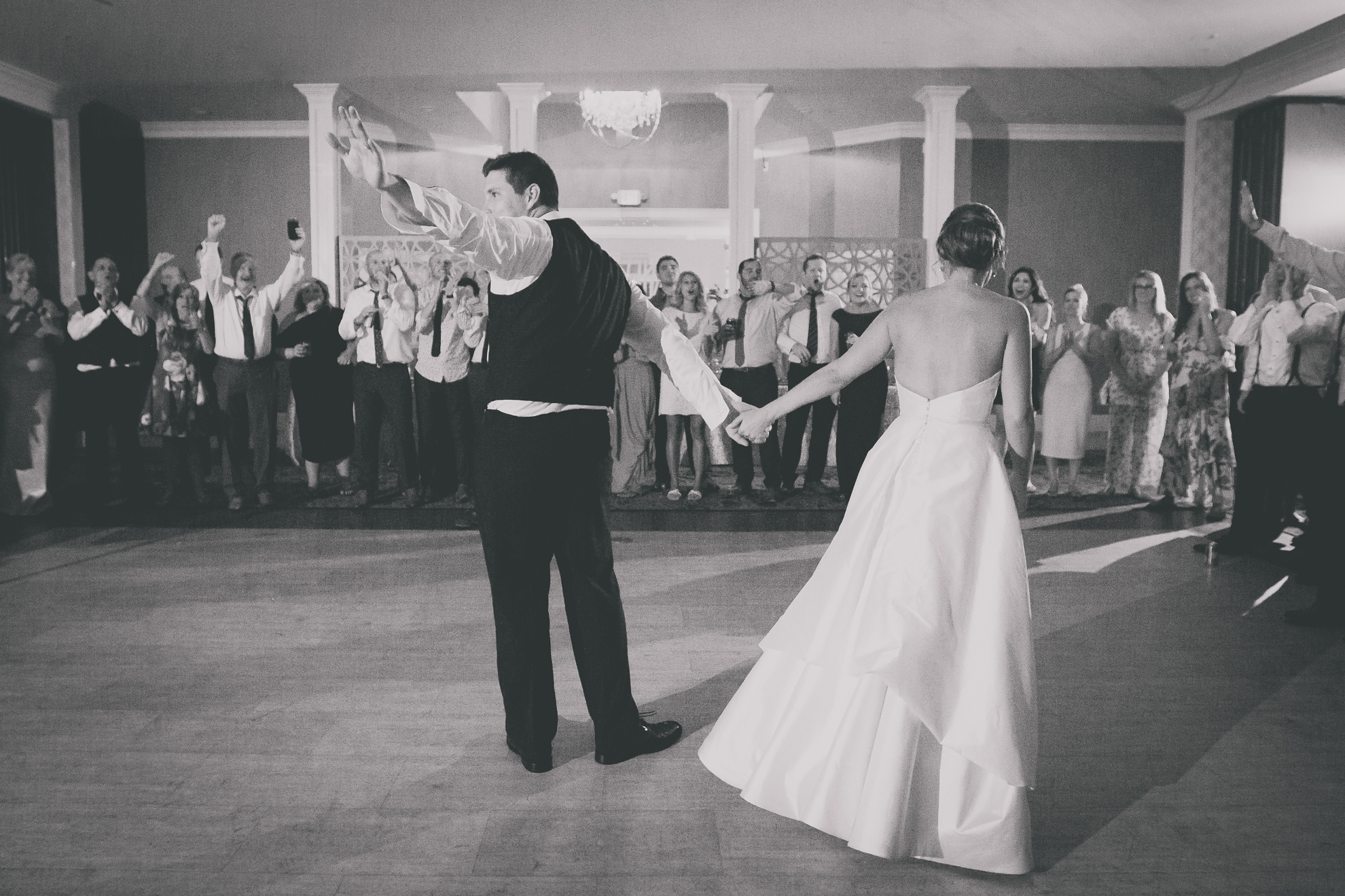 bride and groom dance at wedding reception at Niagara Falls Country Club in Lewiston, NY