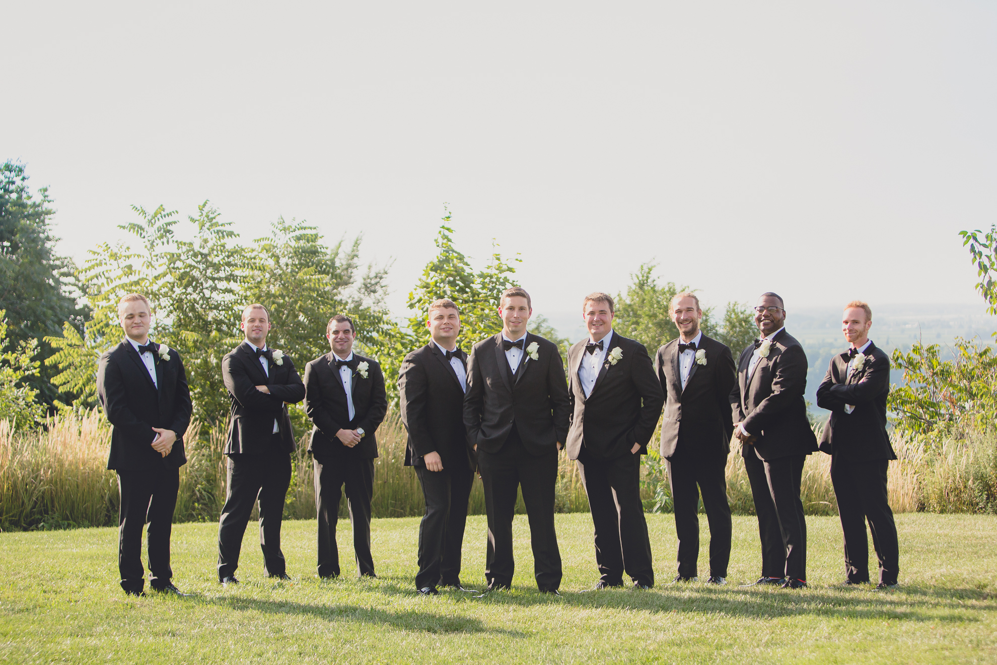 wedding party portrait of groomsmen before wedding reception at Niagara Falls Country Club near Buffalo, NY
