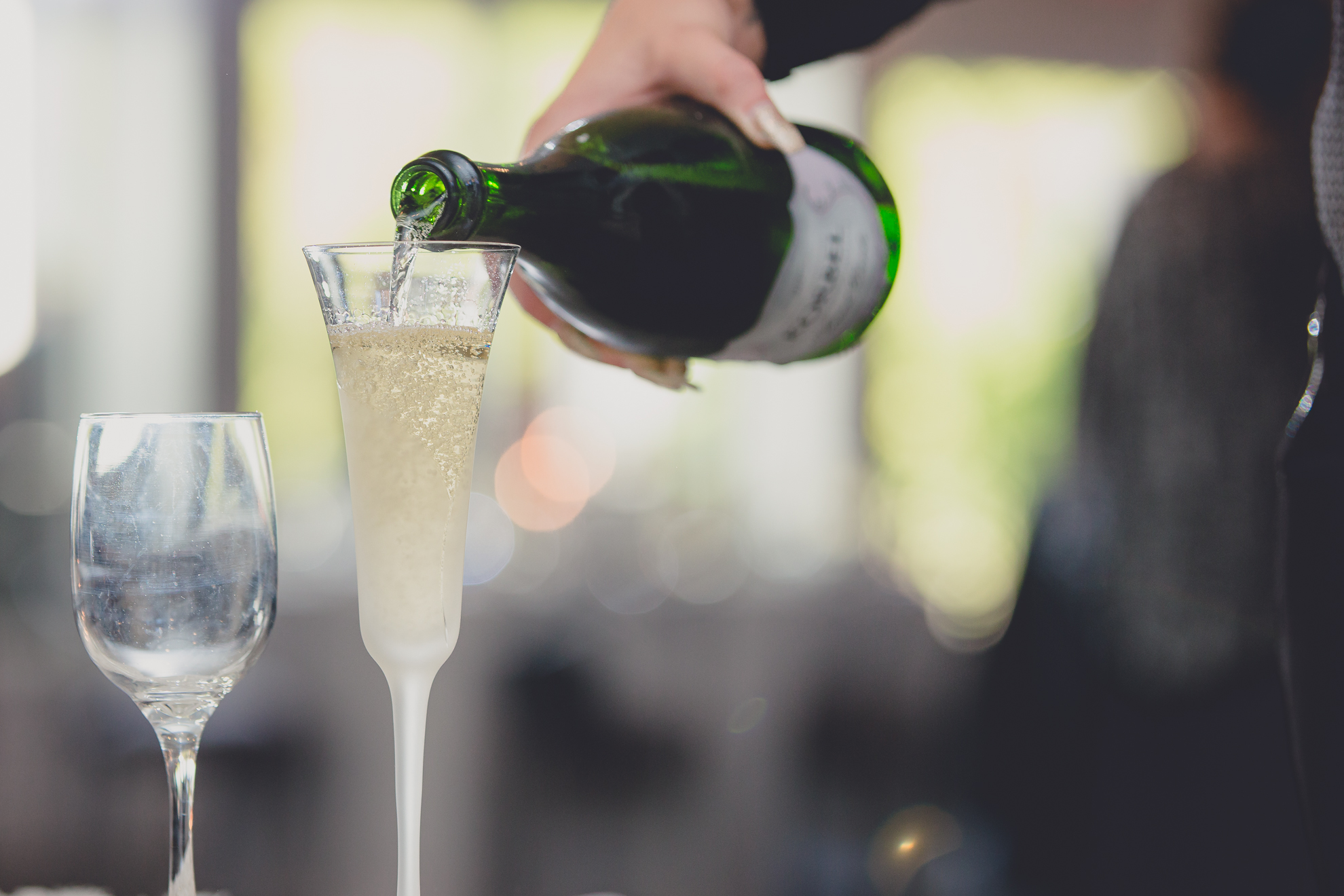 champagne poured at wedding reception at Niagara Falls Country Club in Lewiston, NY