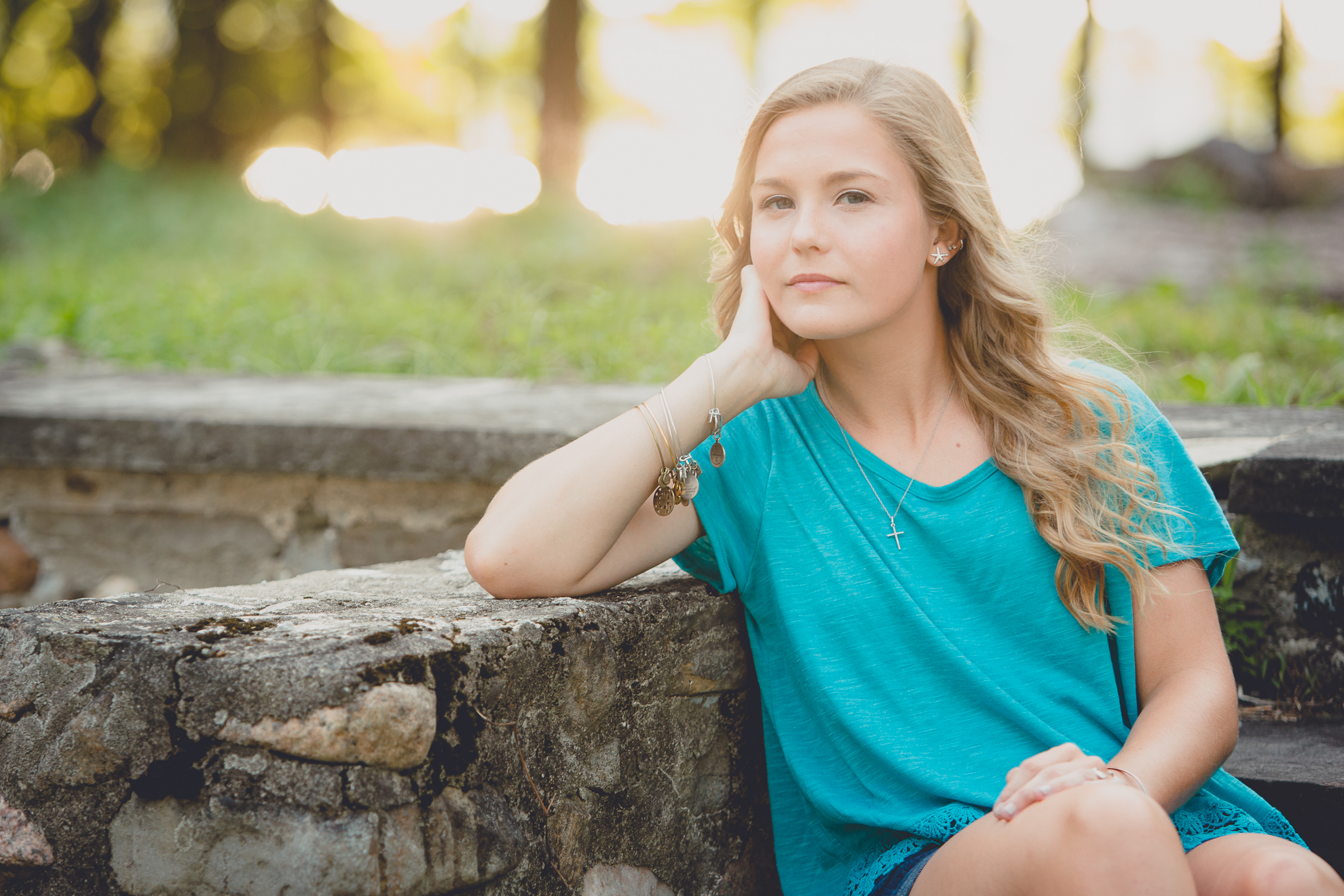 Dana smiles for portrait during her senior session in Long Point State Park near Buffalo, NY