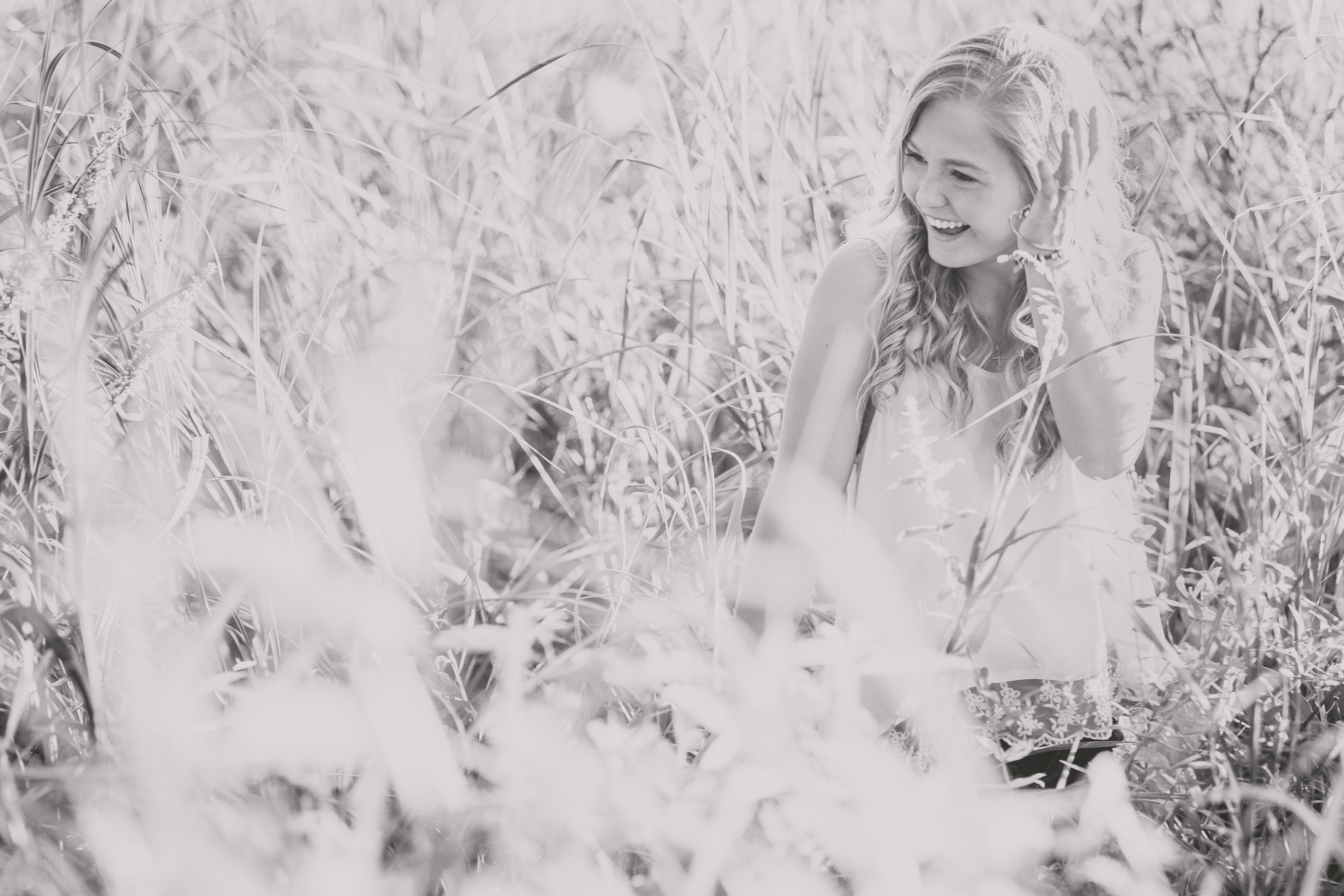 Dana laughs during portrait session in Long Point State Park near Buffalo, NY