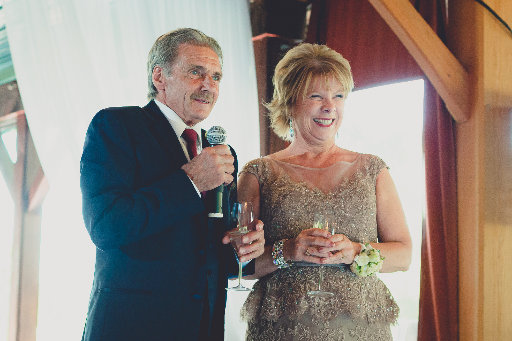 parents deliver speech during outdoor wedding reception at Spring Lake Winery venue near Buffalo in WNY