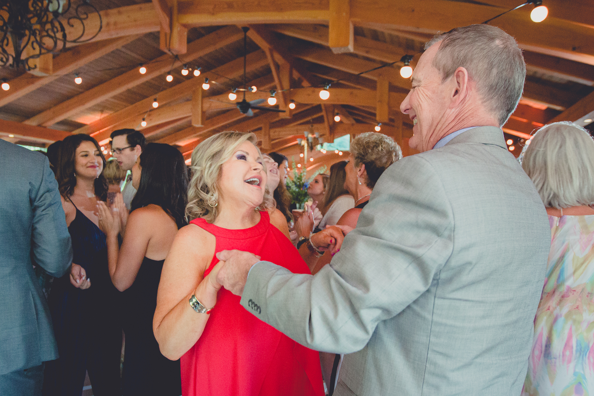 guests dance during outdoor wedding reception at Spring Lake Winery venue near Buffalo in WNY