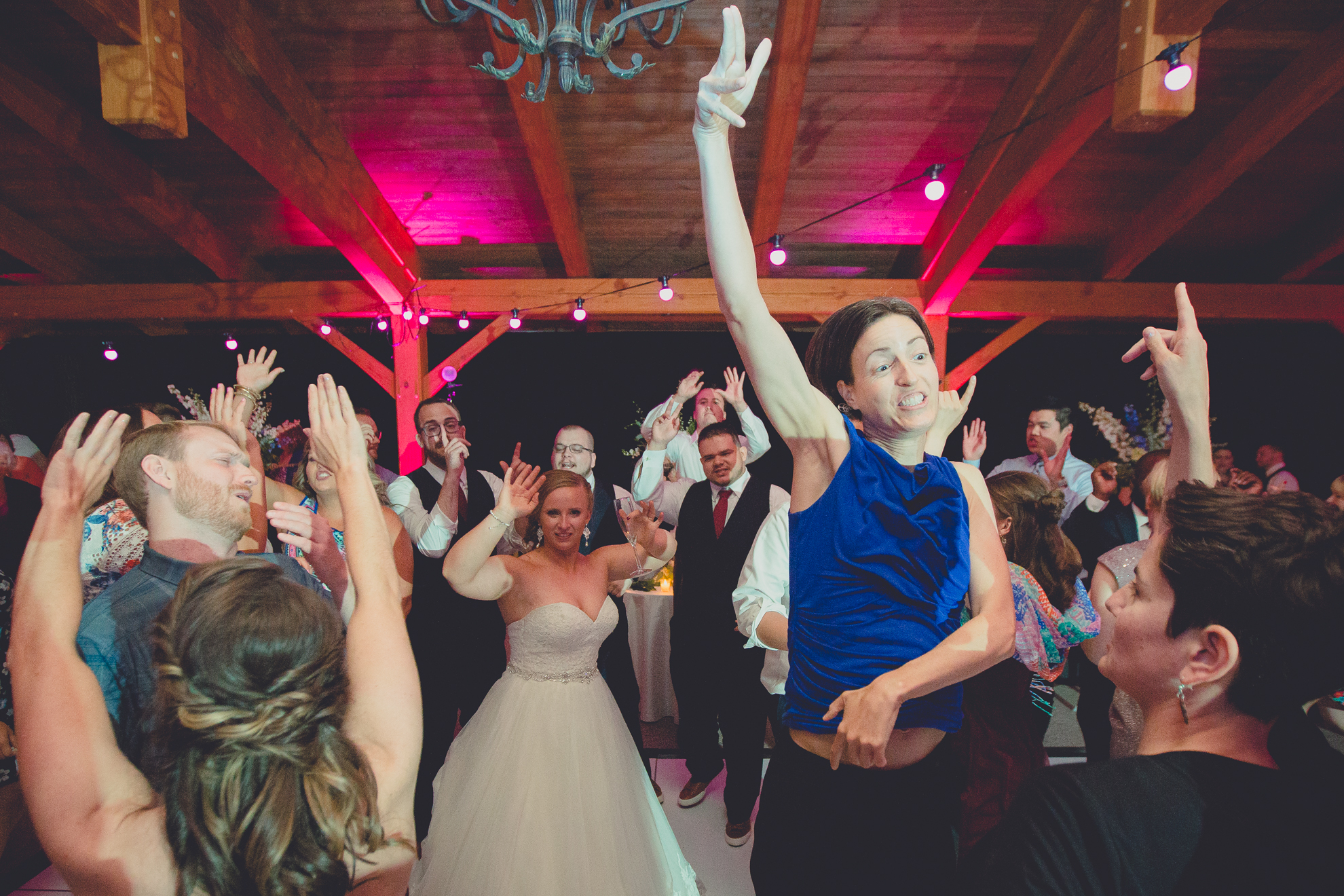 guests dance during outdoor wedding reception at Spring Lake Winery venue near Buffalo in WNY