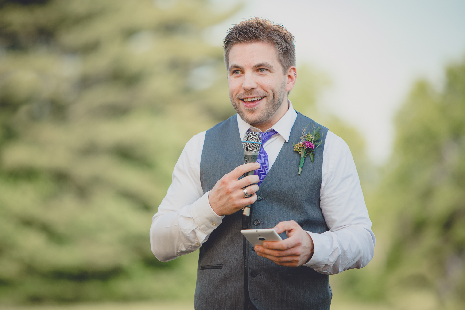 best man delivers speech under tent at reception at wedding at Knox Farm near Buffalo, NY