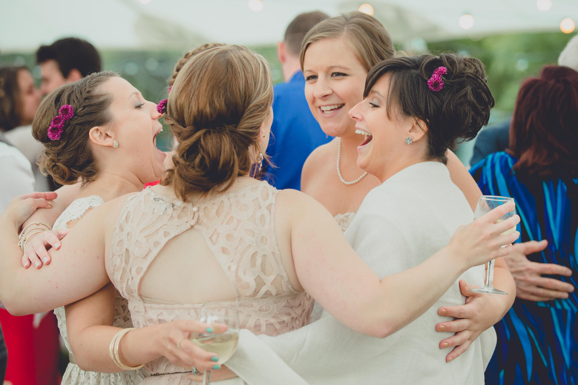 guests dance during tented reception at small wedding venue Knox Farm near Buffalo, NY