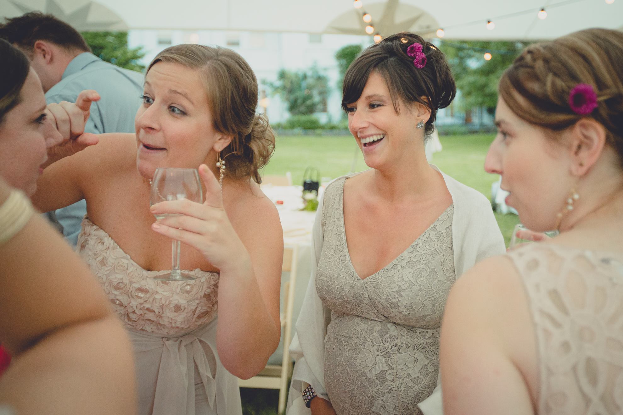 guests dance during tented reception at wedding venue Knox Farm near Buffalo, NY