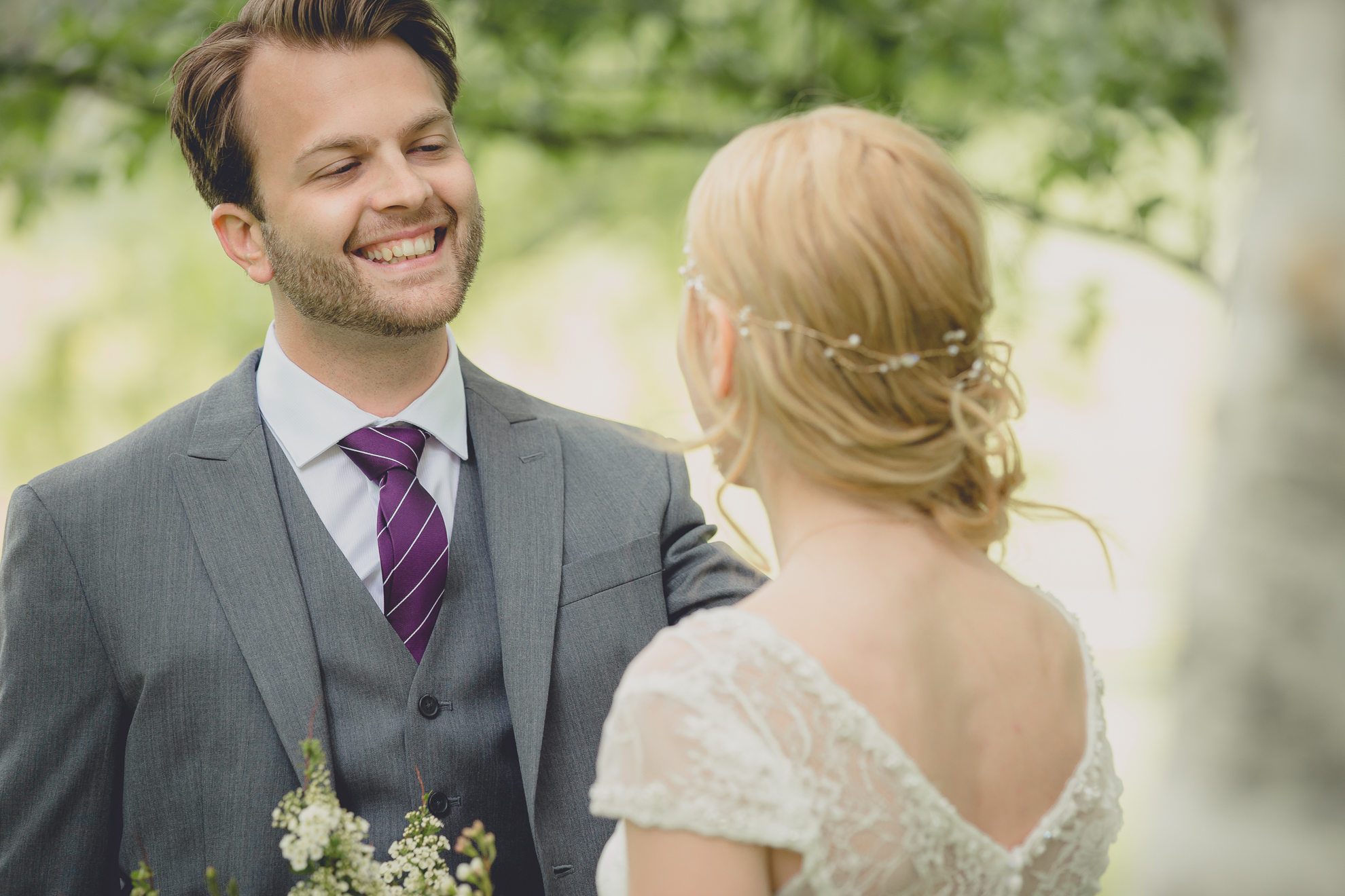 bride and groom see each other for the first time during their first look, aka reveal at their small wedding at Knox Farm near Buffalo, NY