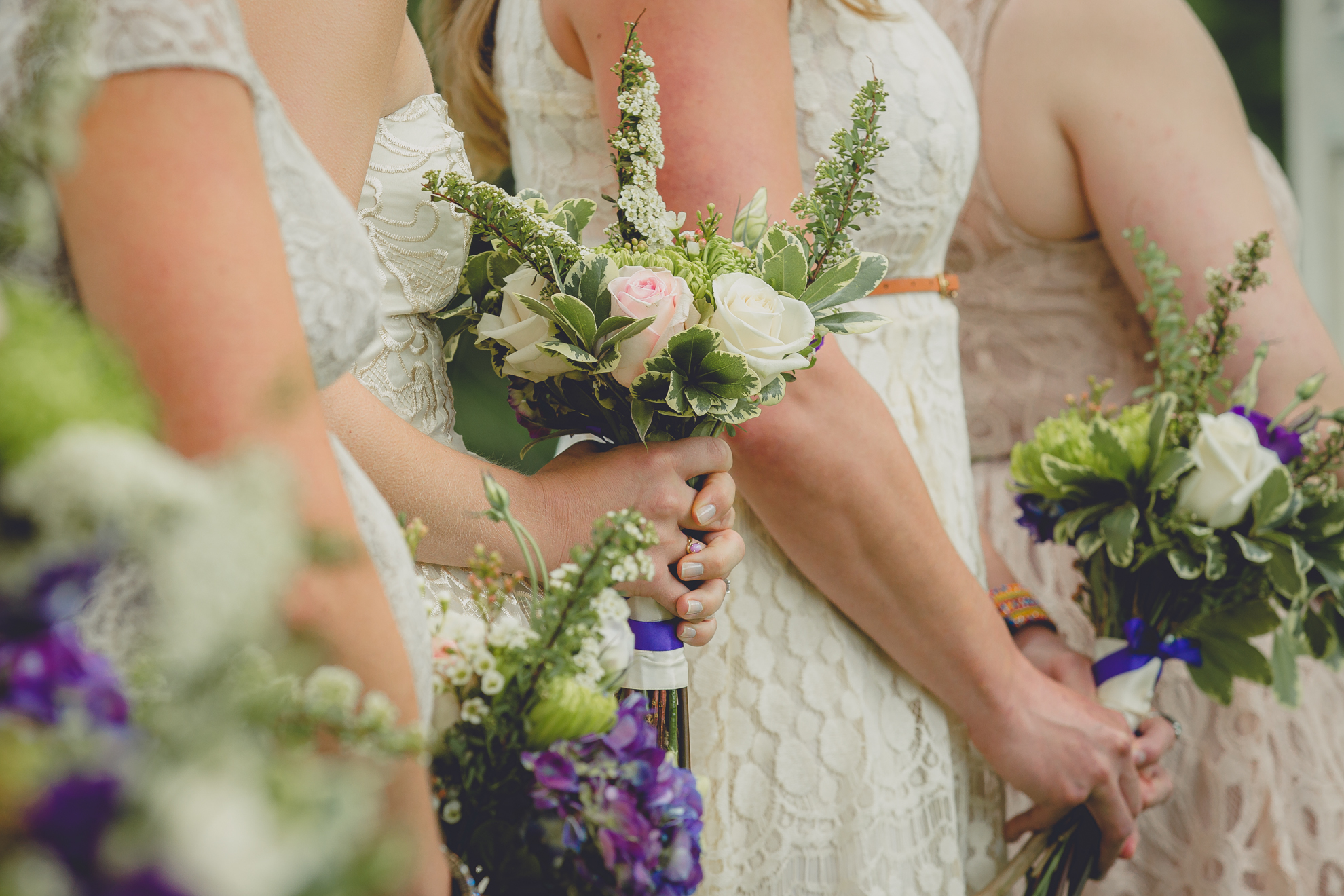 bridesmaids flowers during ceremony at small wedding at Knox Farm near Buffalo, NY