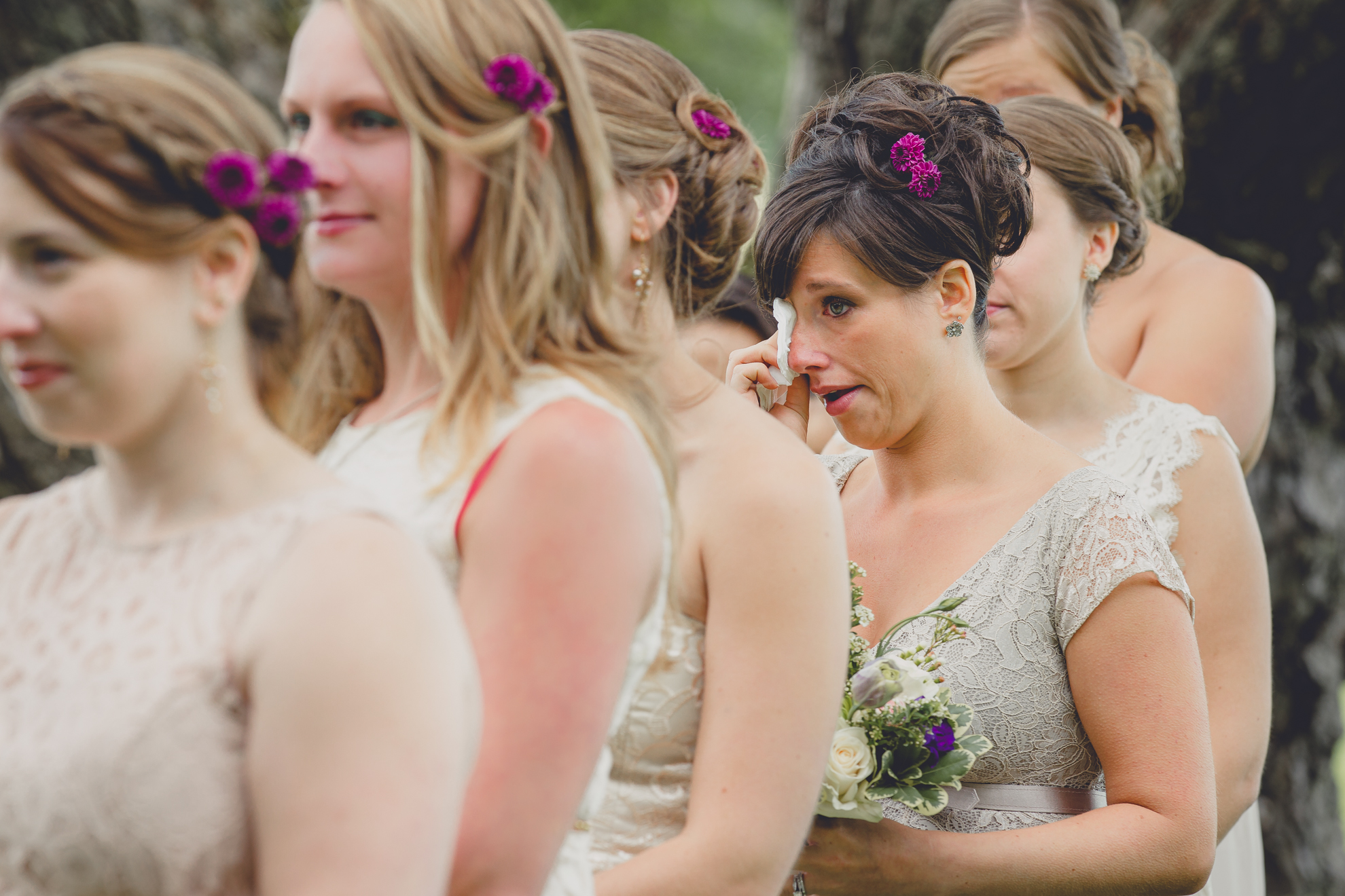 bridesmaid cries during ceremony at small wedding at Knox Farm near Buffalo, NY