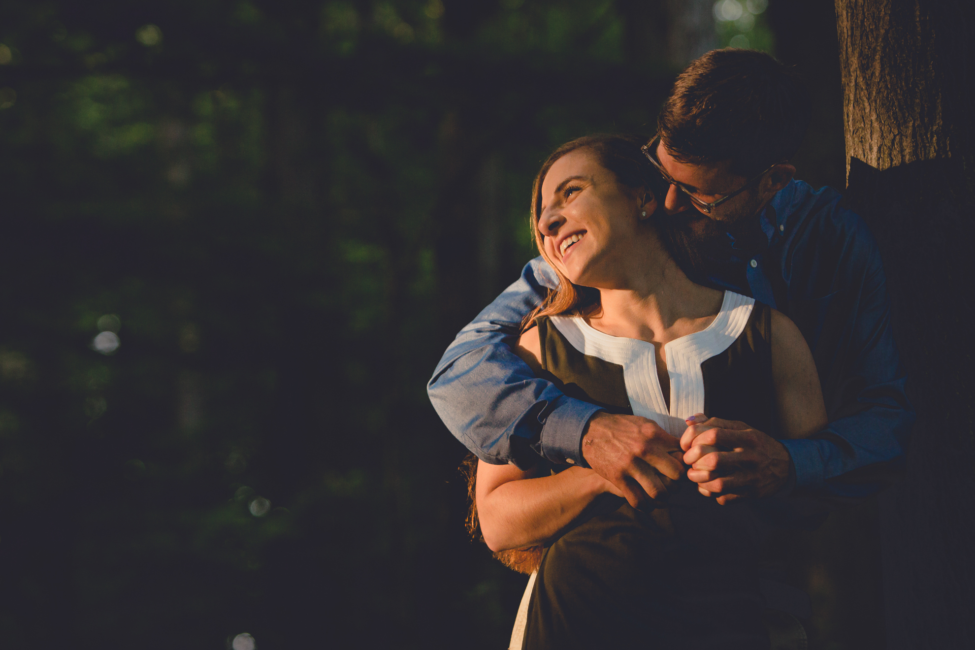 bride and groom kiss in field during wedding engagement photography at Knox Farm State Park near Buffalo, NY
