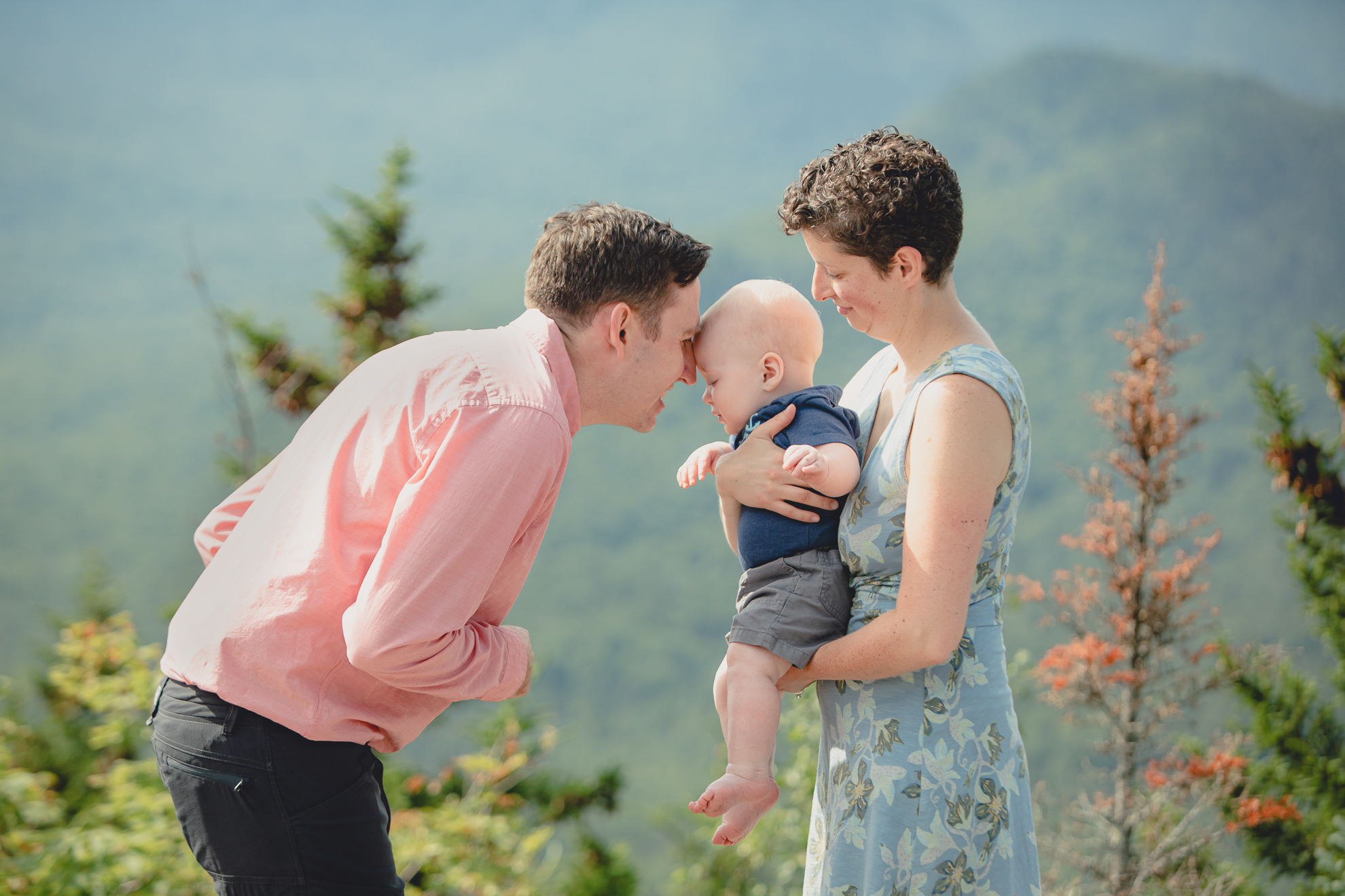 wedding vow renewal ceremony on summit of Mount Jo during photojournalistic family photography session in the Adirondack High Peaks Region of NY