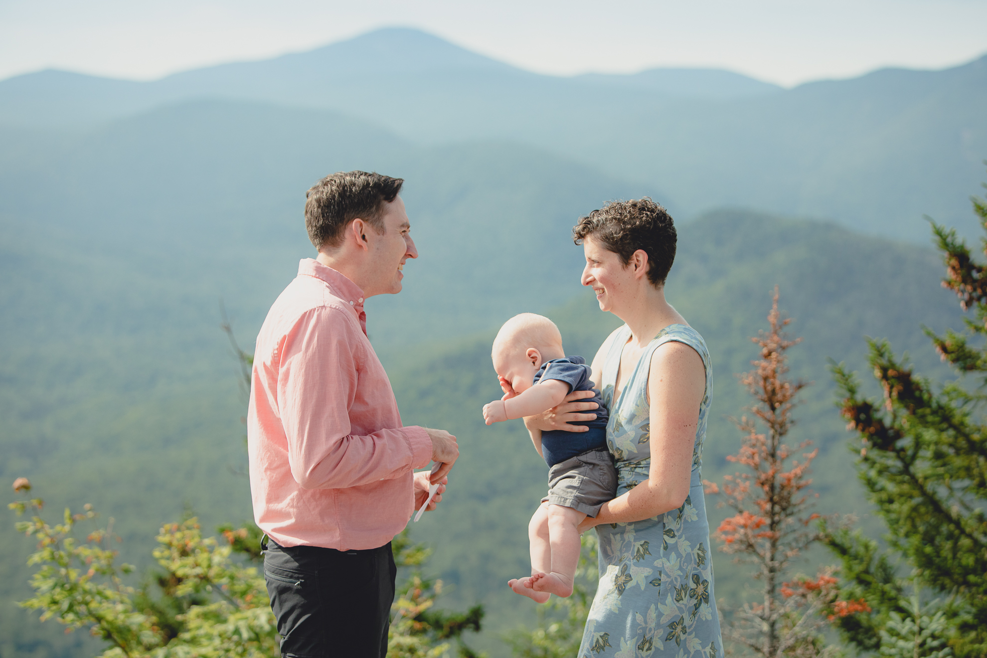 wedding vow renewal ceremony on summit of Mount Jo during photojournalistic family photography session in the Adirondack High Peaks Region of NY