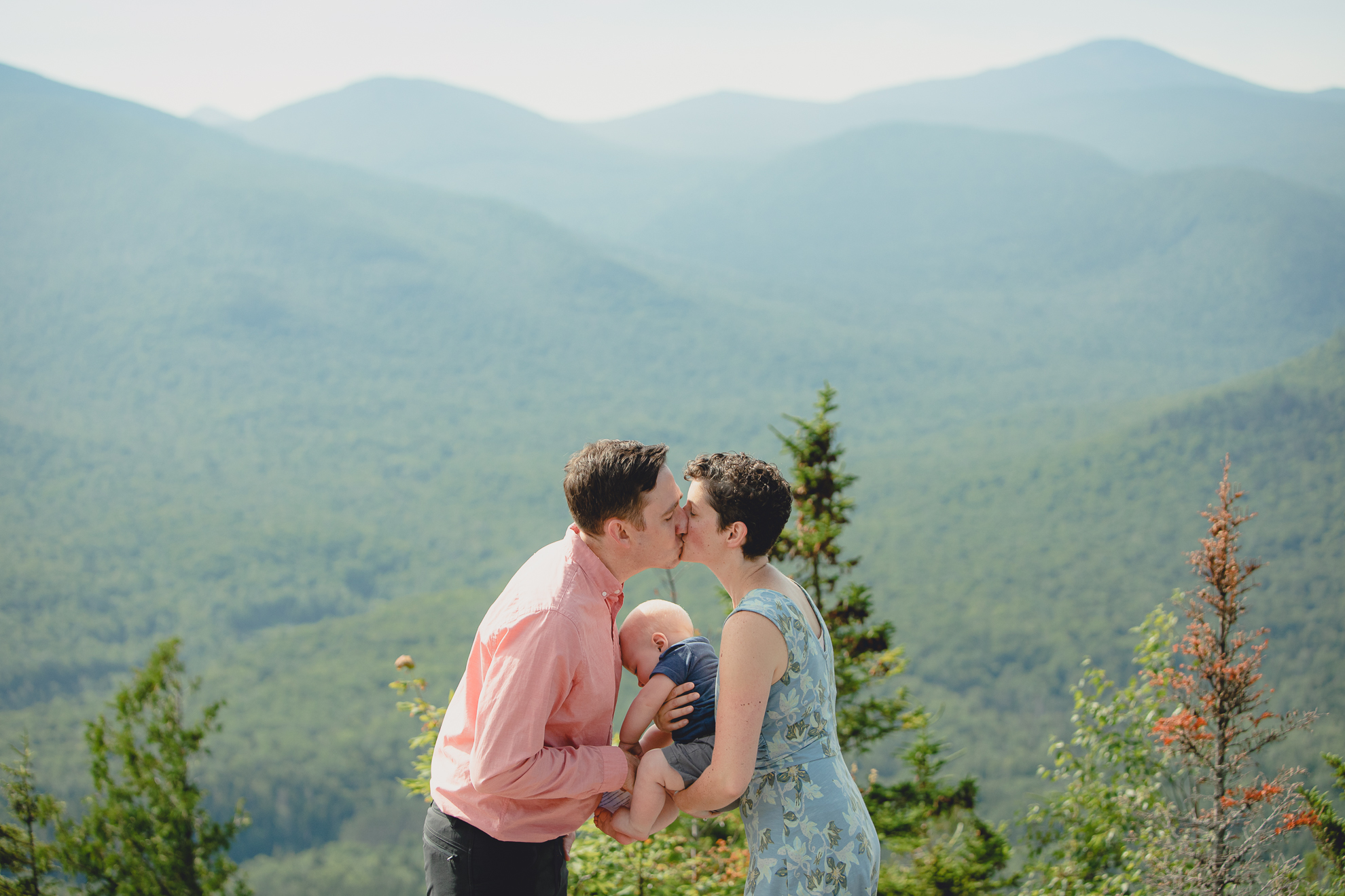 wedding vow renewal ceremony on summit of Mount Jo during photojournalistic family photography session in the Adirondack High Peaks Region of NY