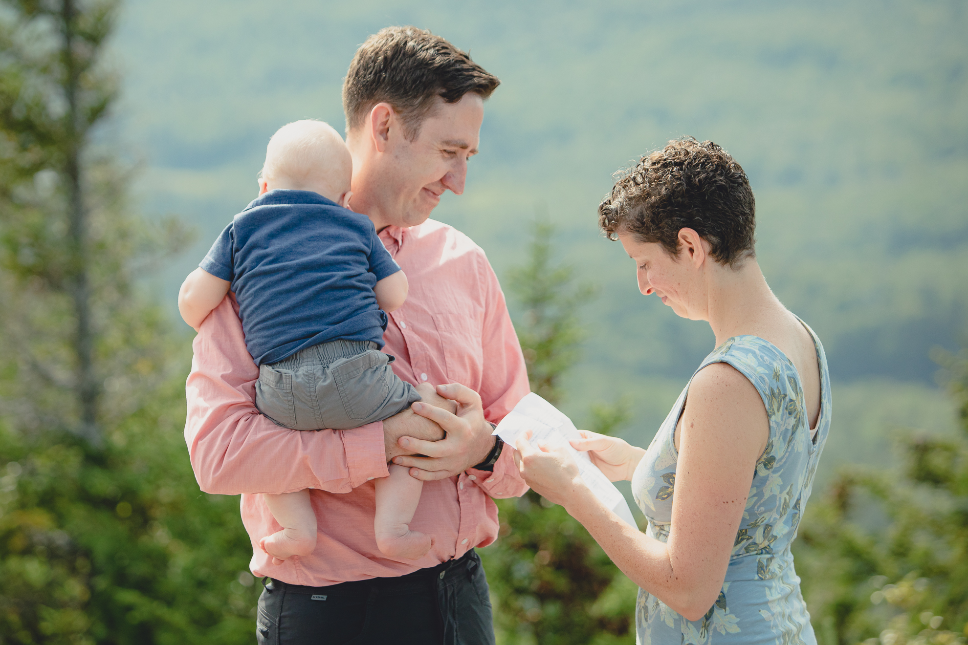 wedding vow renewal ceremony on summit of Mount Jo during photojournalistic family photography session in the Adirondack High Peaks Region of NY