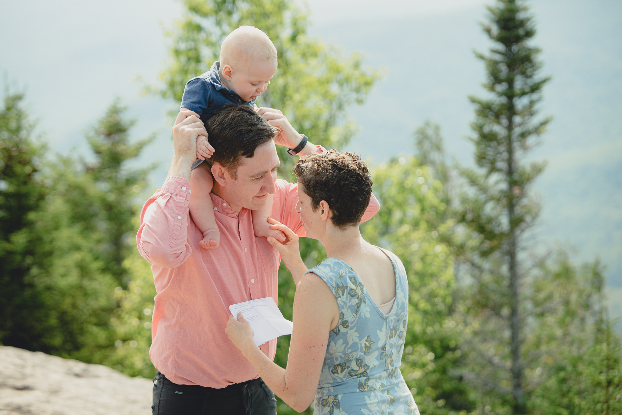 wedding vow renewal ceremony on summit of Mount Jo during photojournalistic family photography session in the Adirondack High Peaks Region of NY