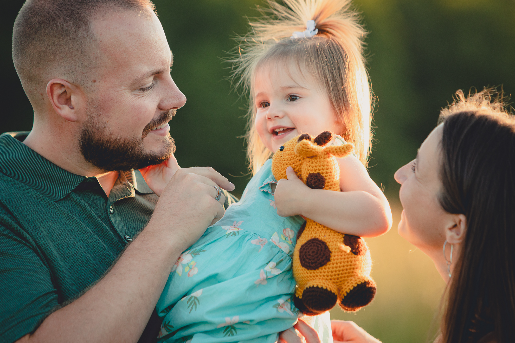 family laughing during portrait photography session at Knox Farm in East Aurora, a small town near Buffalo