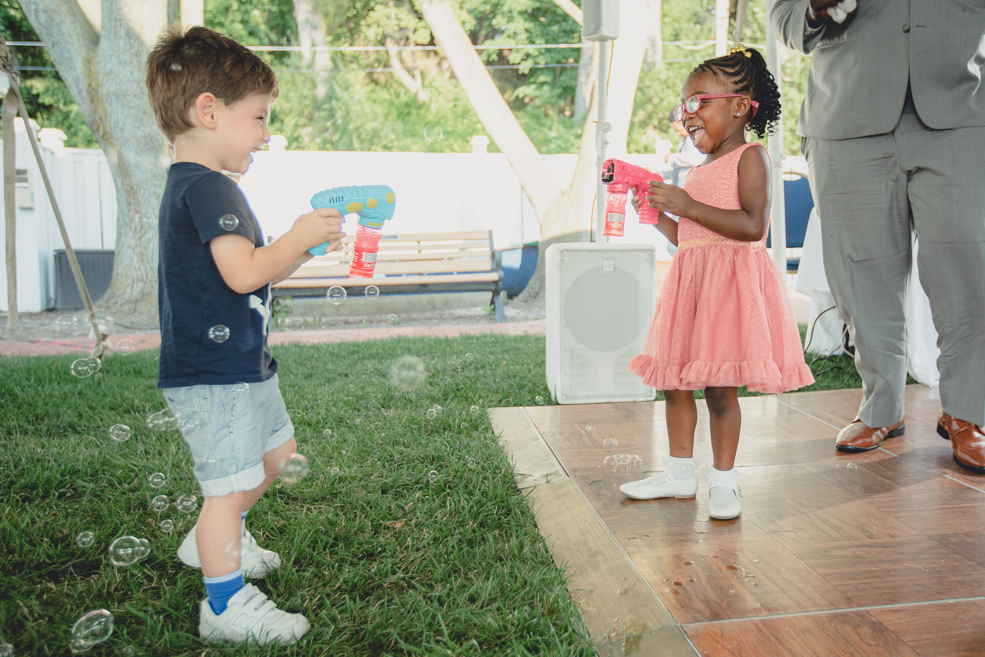 kids use bubble guns groom at Youngstown Yacht Club during WNY micro wedding