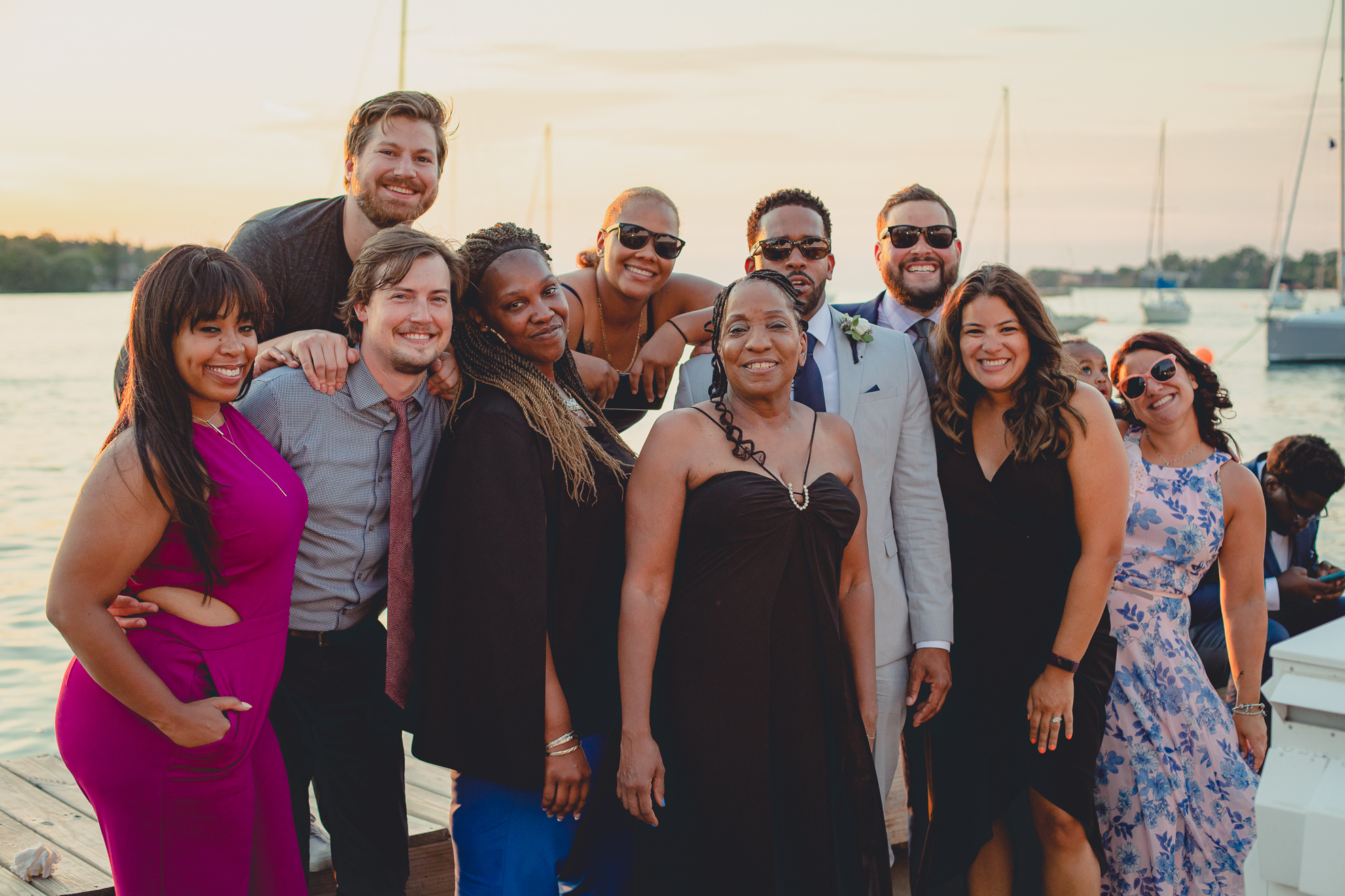 guests smile for photographer at Youngstown Yacht Club during WNY micro wedding