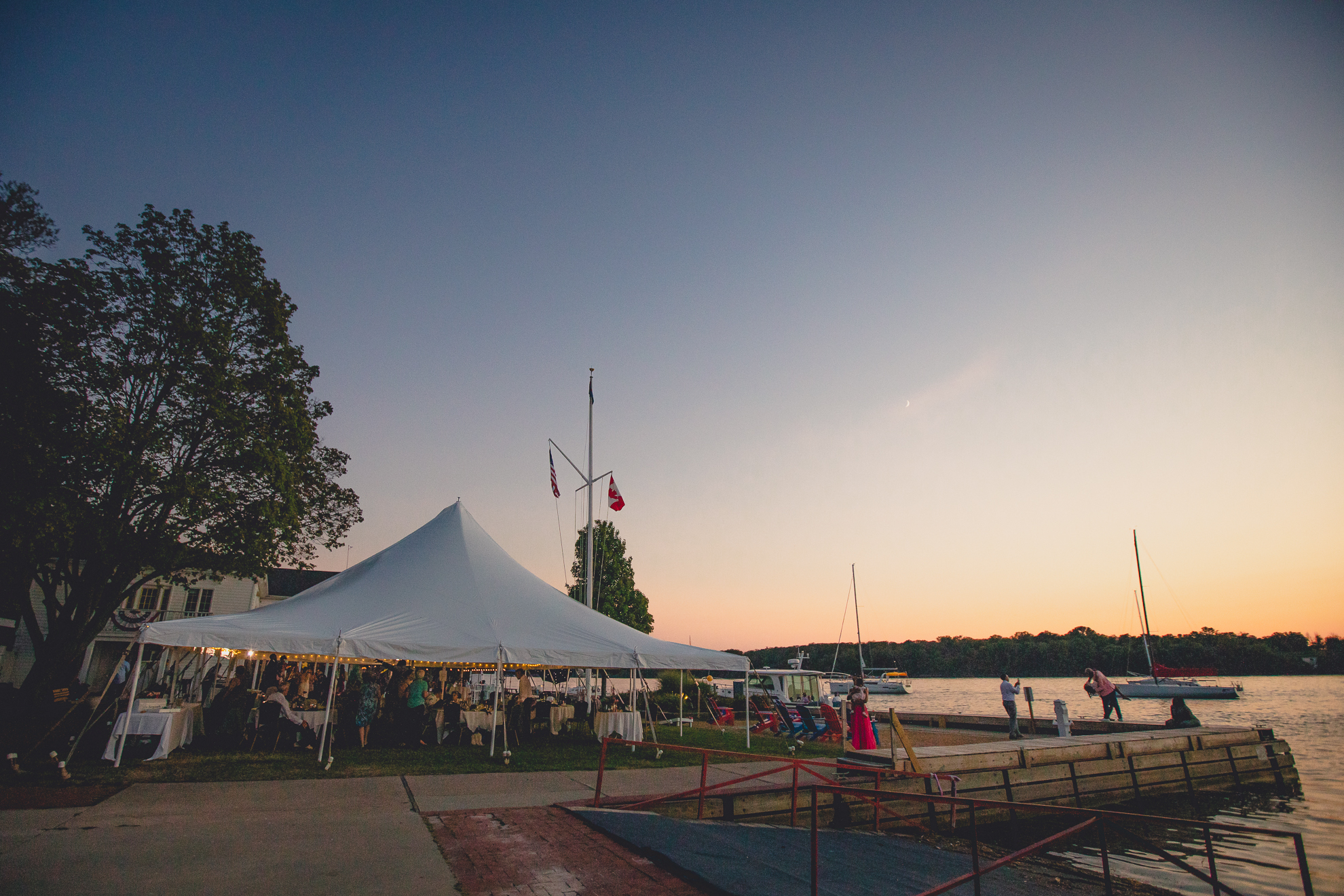 wedding tent in front of Niagara River at Youngstown Yacht Club during WNY micro wedding