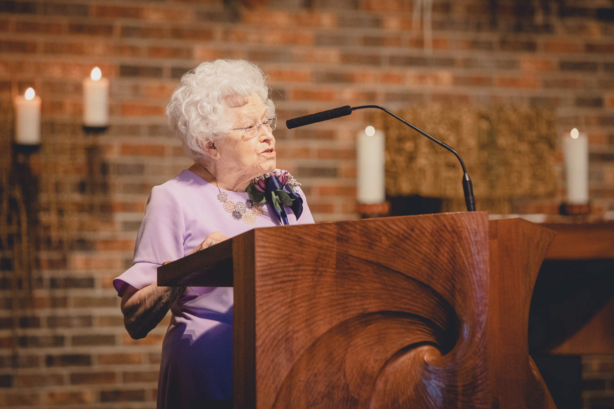 grandmother gives reading during micro wedding ceremony at St. Peter's Church in Lewiston, NY