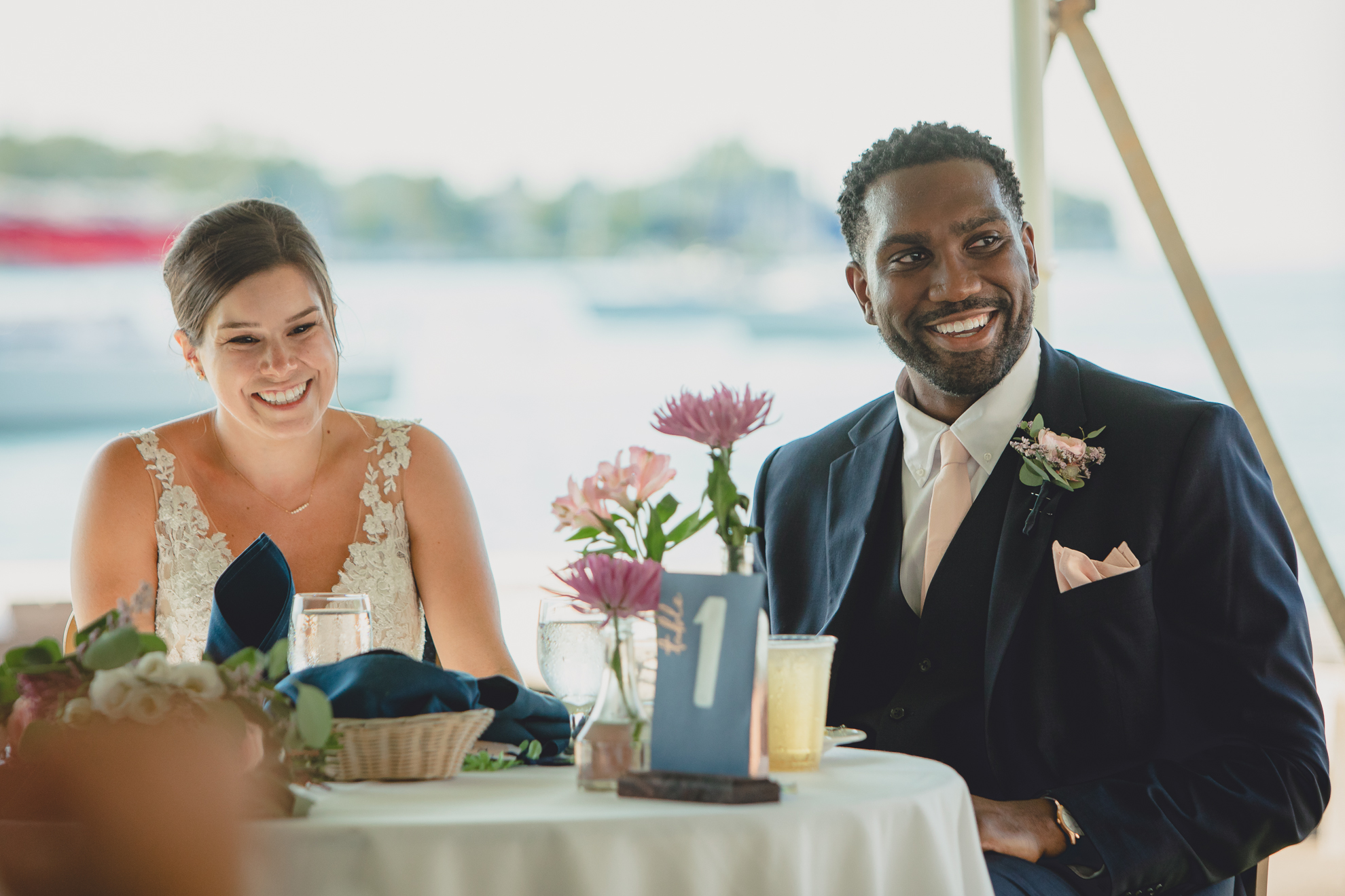 bride and groom laugh during at Youngstown Yacht Club during WNY micro wedding