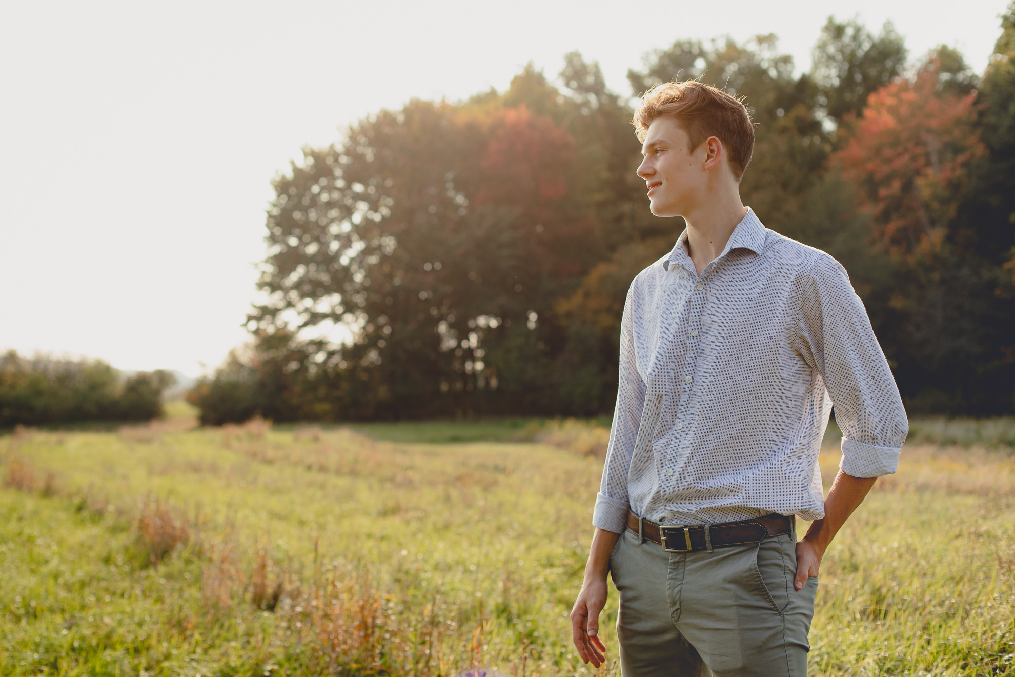 wny senior from east aurora highschool poses for photographer during senior portrait photography session at Knox Farm near Buffalo, NY