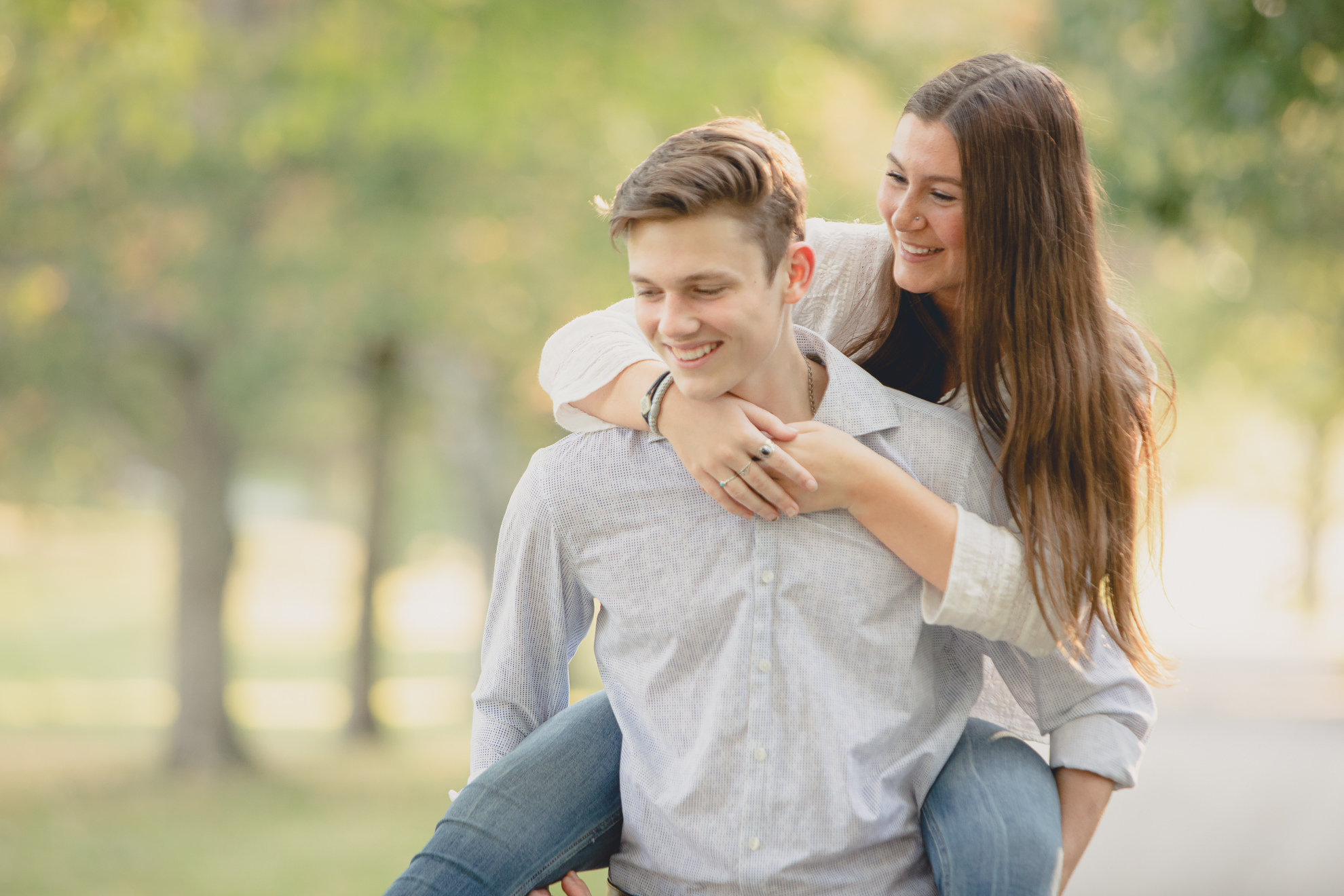 wny senior from east aurora highschool poses with girlfriend during senior portrait photography session at Knox Farm near Buffalo, NY