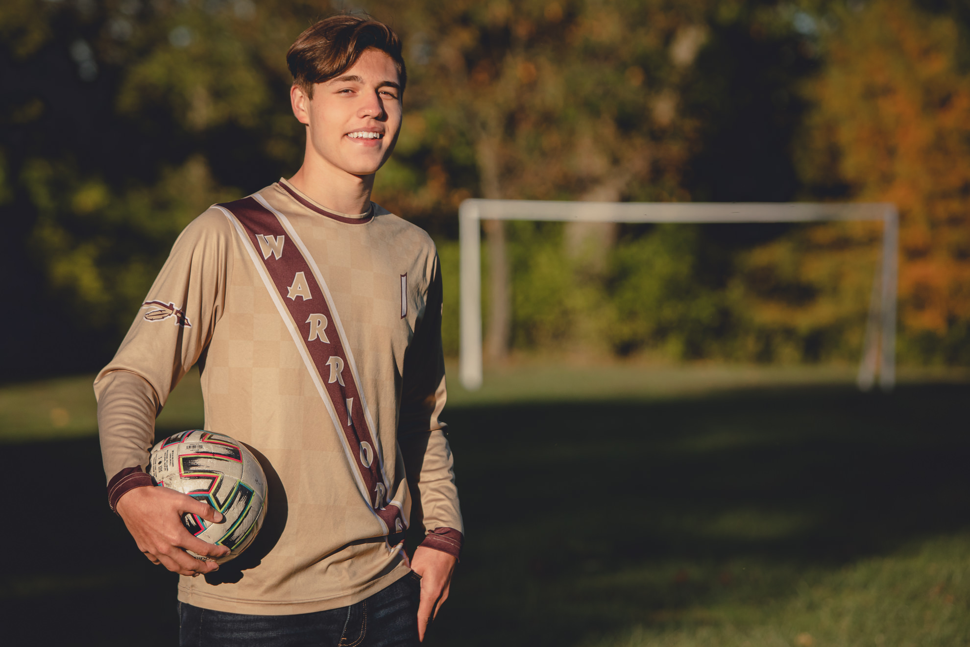 cheektowaga central high school senior portrait photography at Rumsey soccer field Delaware Park in Buffalo, NY