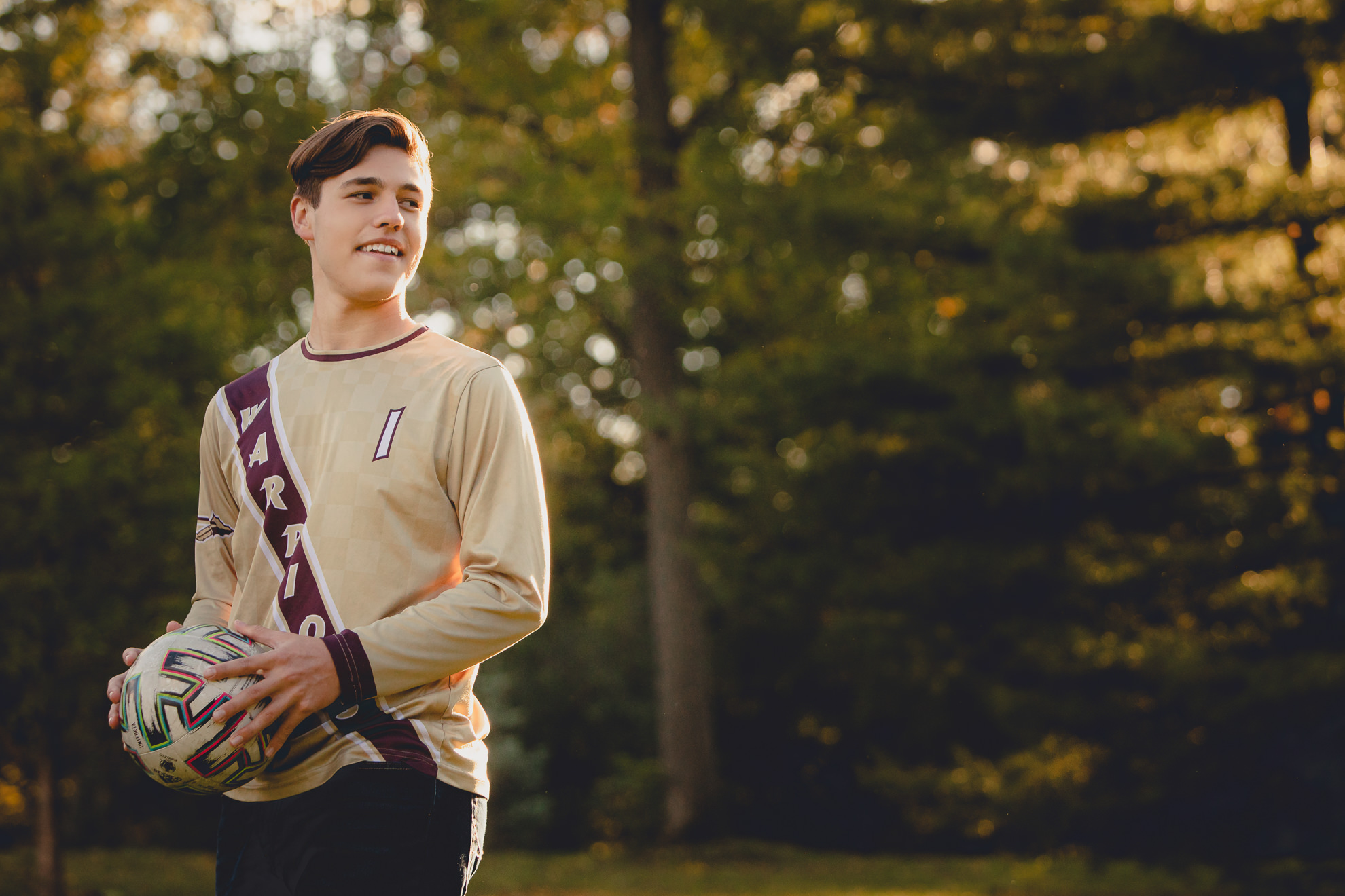 cheektowaga central high school senior portrait photography at Rumsey soccer field Delaware Park in Buffalo, NY