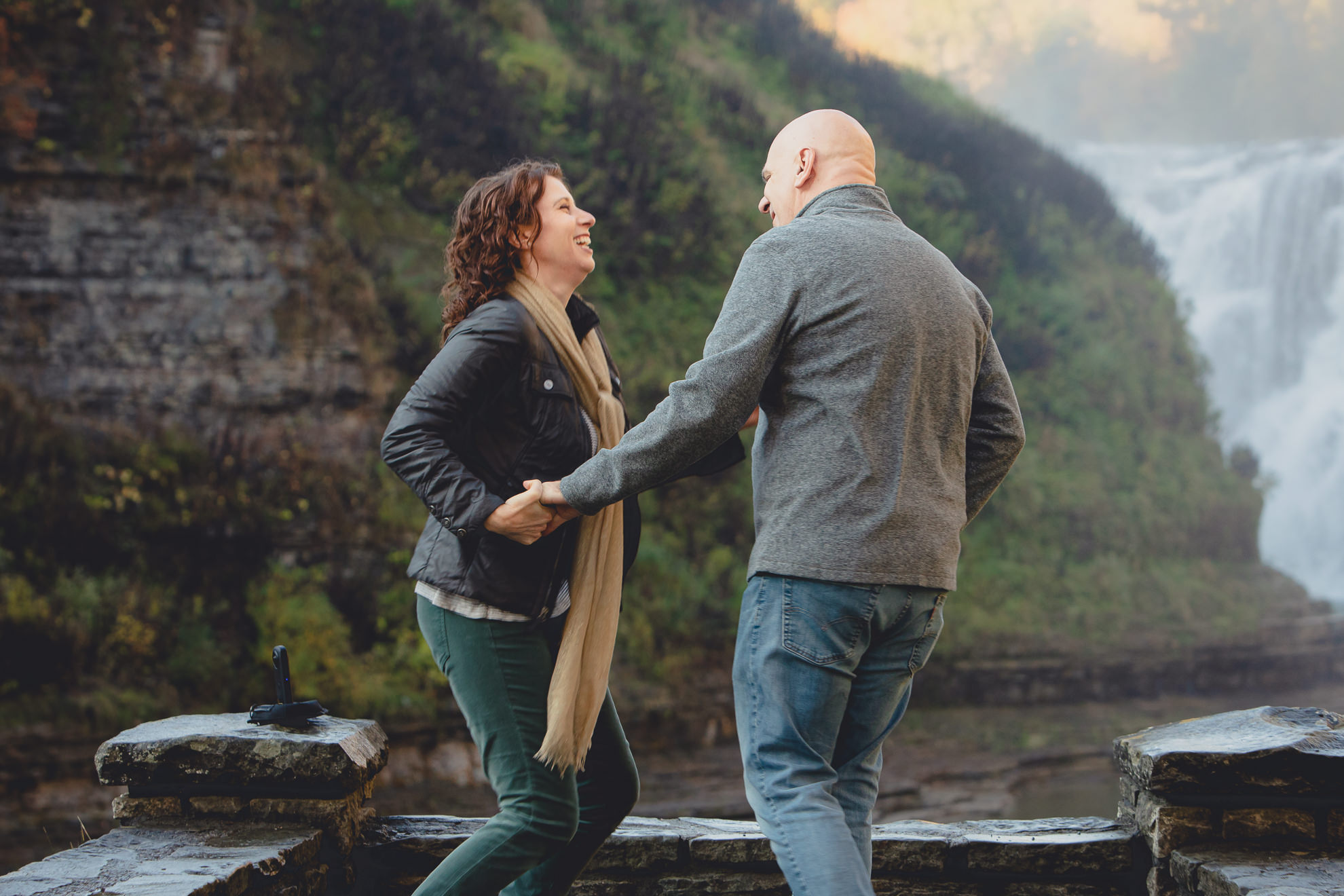 bride proposes to groom in front of Upper Falls at Letchworth State Park near Buffalo, NY