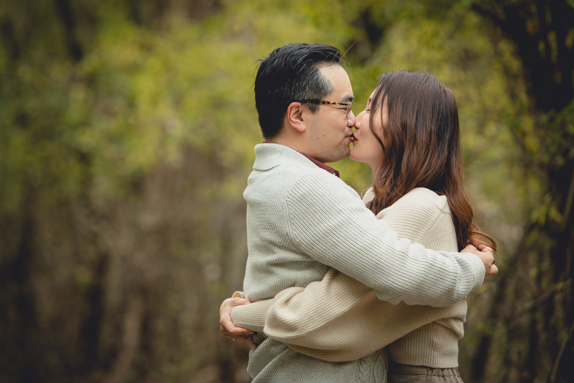 bride and groom kiss during wedding engagement proposal at Tifft Nature Preserve in Buffalo, NY