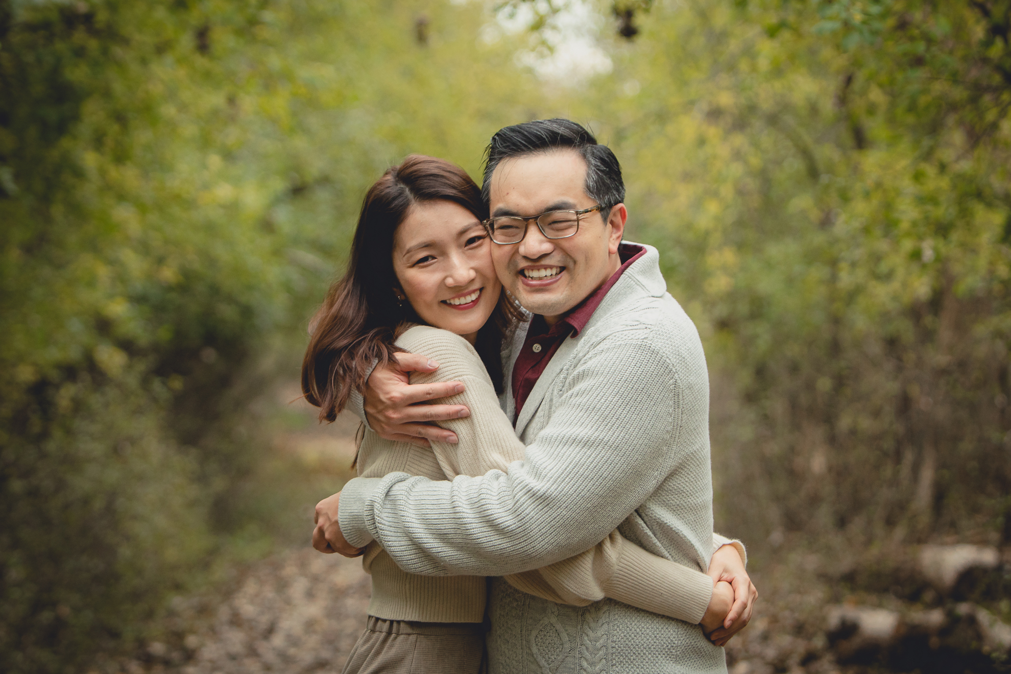 man and woman hug during wedding engagement proposal at Tifft Nature Preserve in Buffalo, NY
