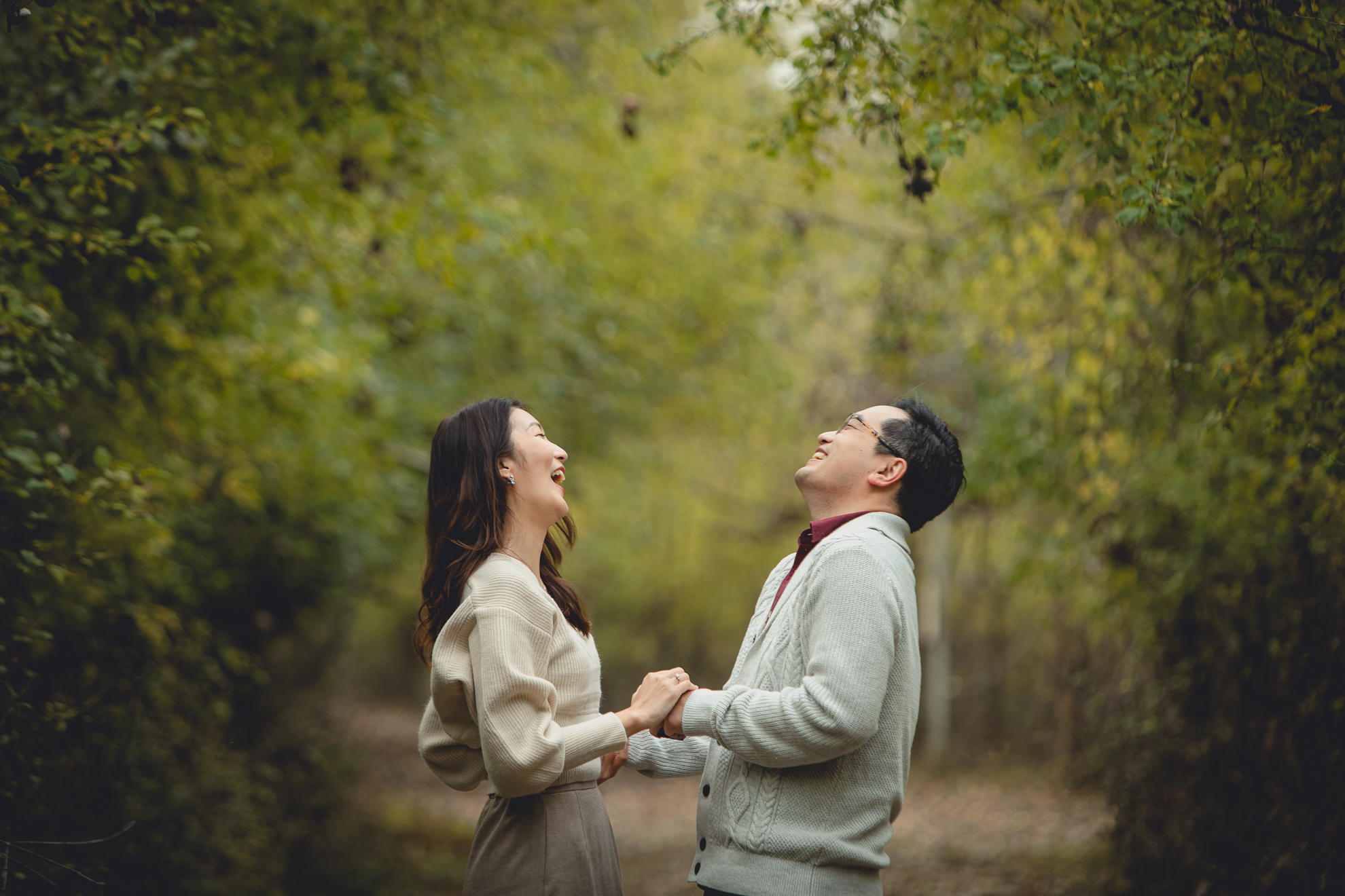 bride and groom laugh during wedding engagement proposal at Tifft Nature Preserve in Buffalo, NY