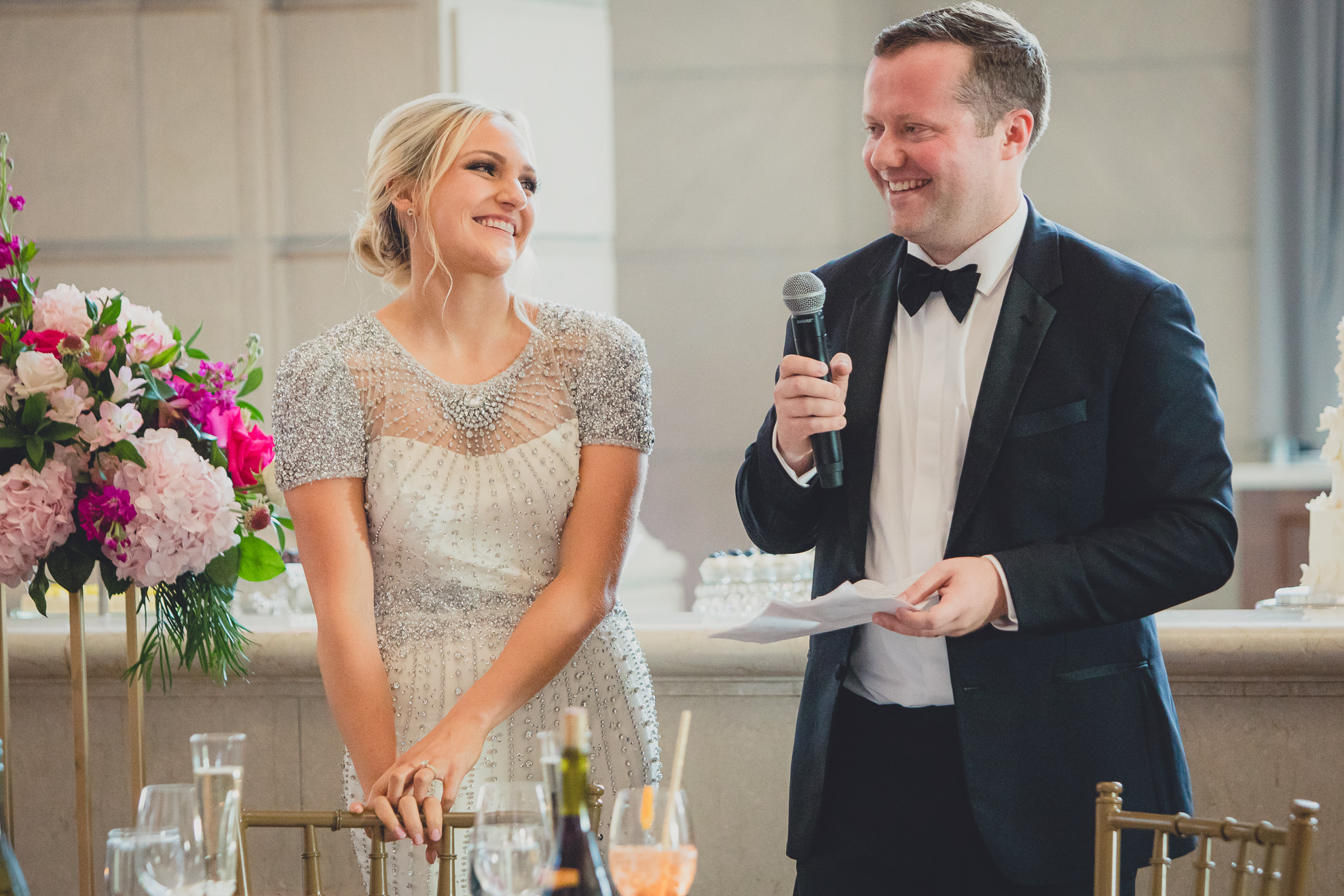 bride and groom deliver speech at Admiral Room Ballroom wedding reception venue in downtown Buffalo, NY