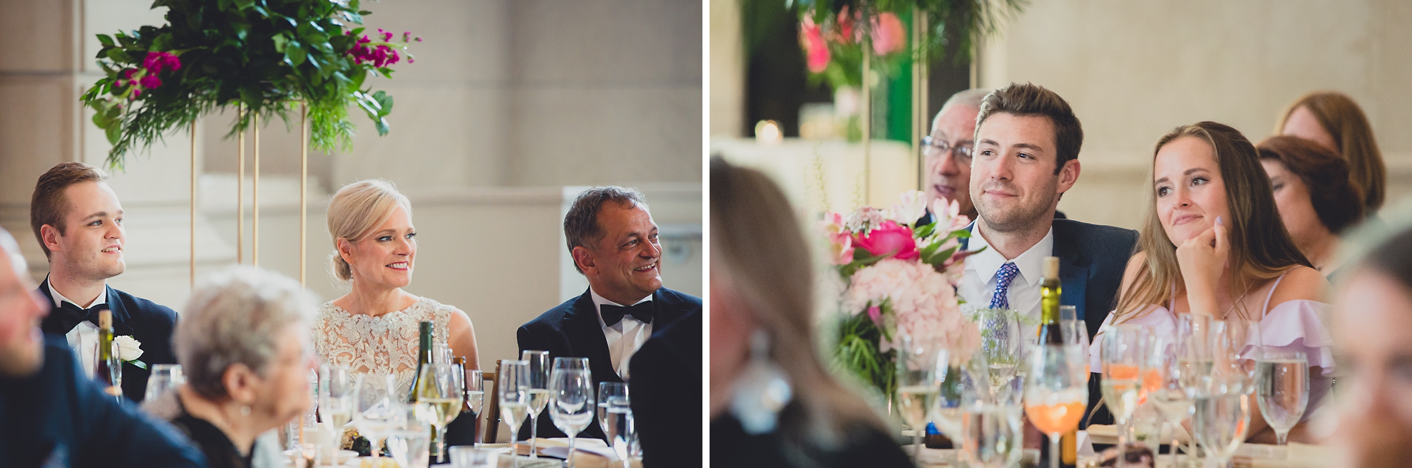 guests smile at bride and groom during speech at Admiral Room Ballroom wedding reception venue in downtown Buffalo, NY