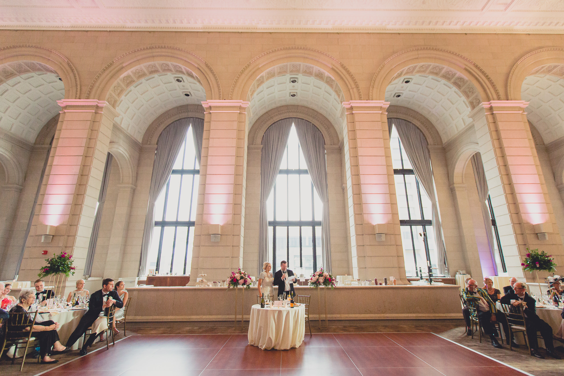 bride and groom deliver speech speech at Admiral Room Ballroom wedding reception venue in downtown Buffalo, NY
