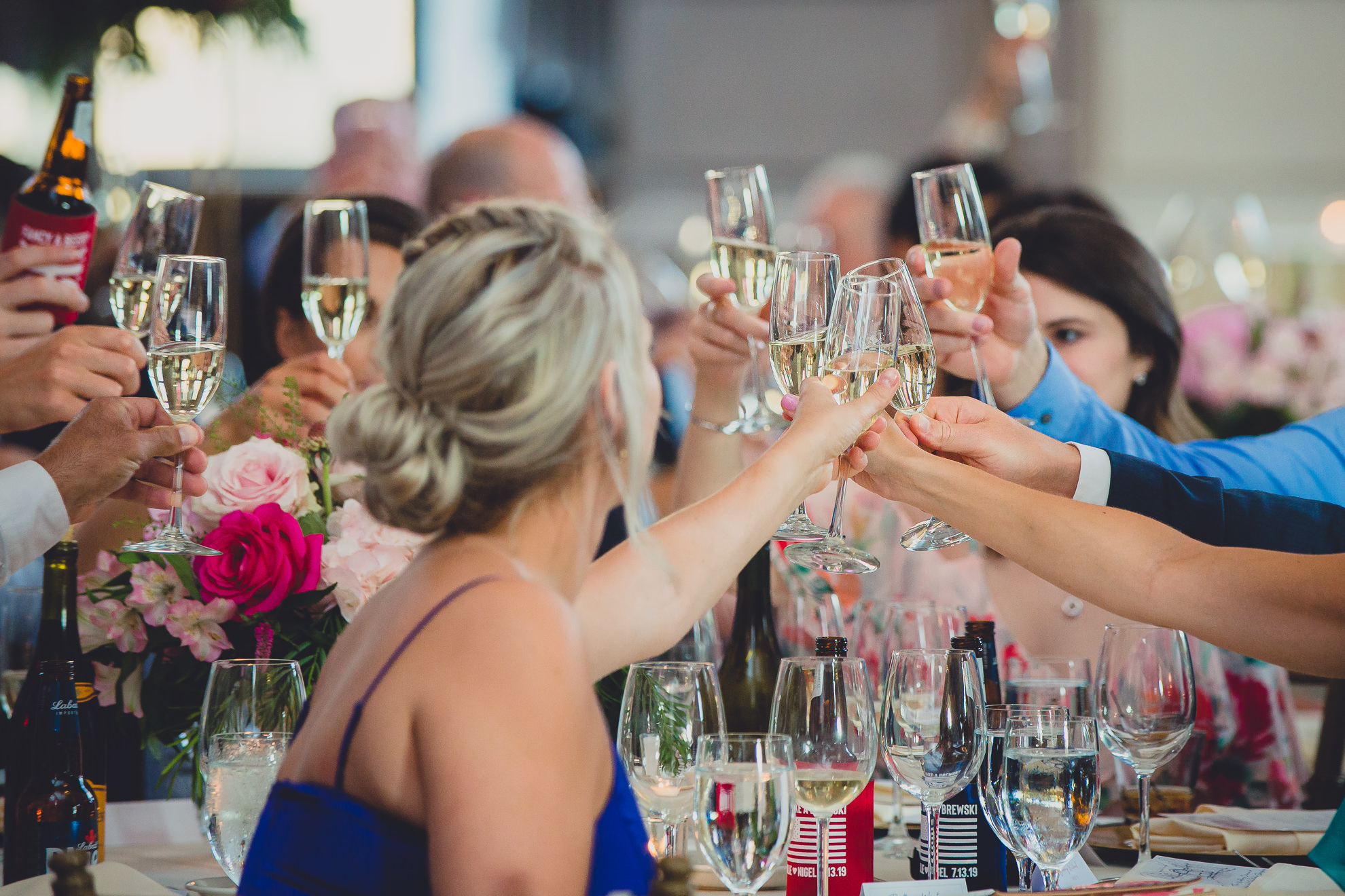 guests toast after speech at Admiral Room Ballroom wedding reception venue in downtown Buffalo, NY