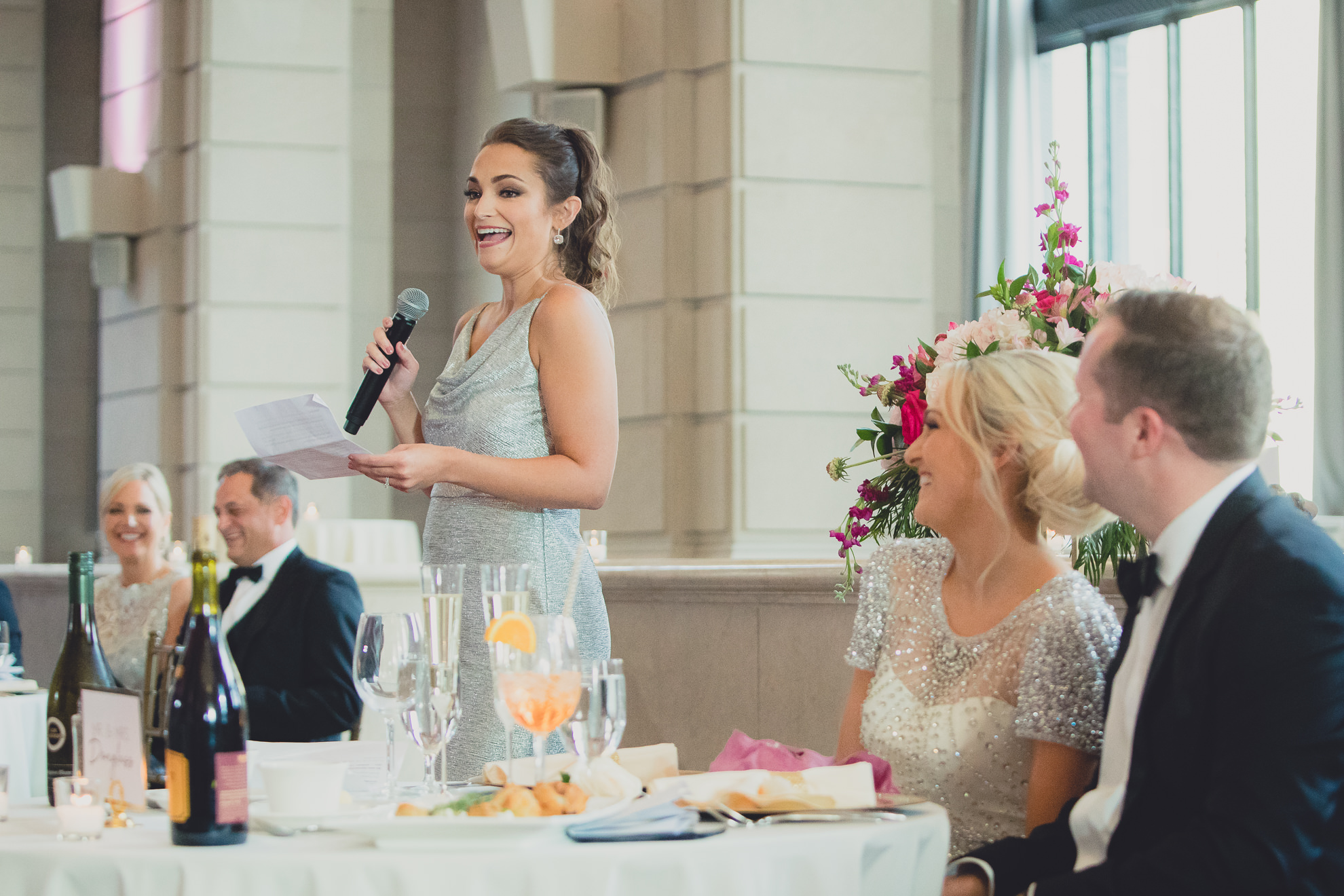 maid of honor delivers speech at Admiral Room Ballroom wedding reception venue in downtown Buffalo, NY