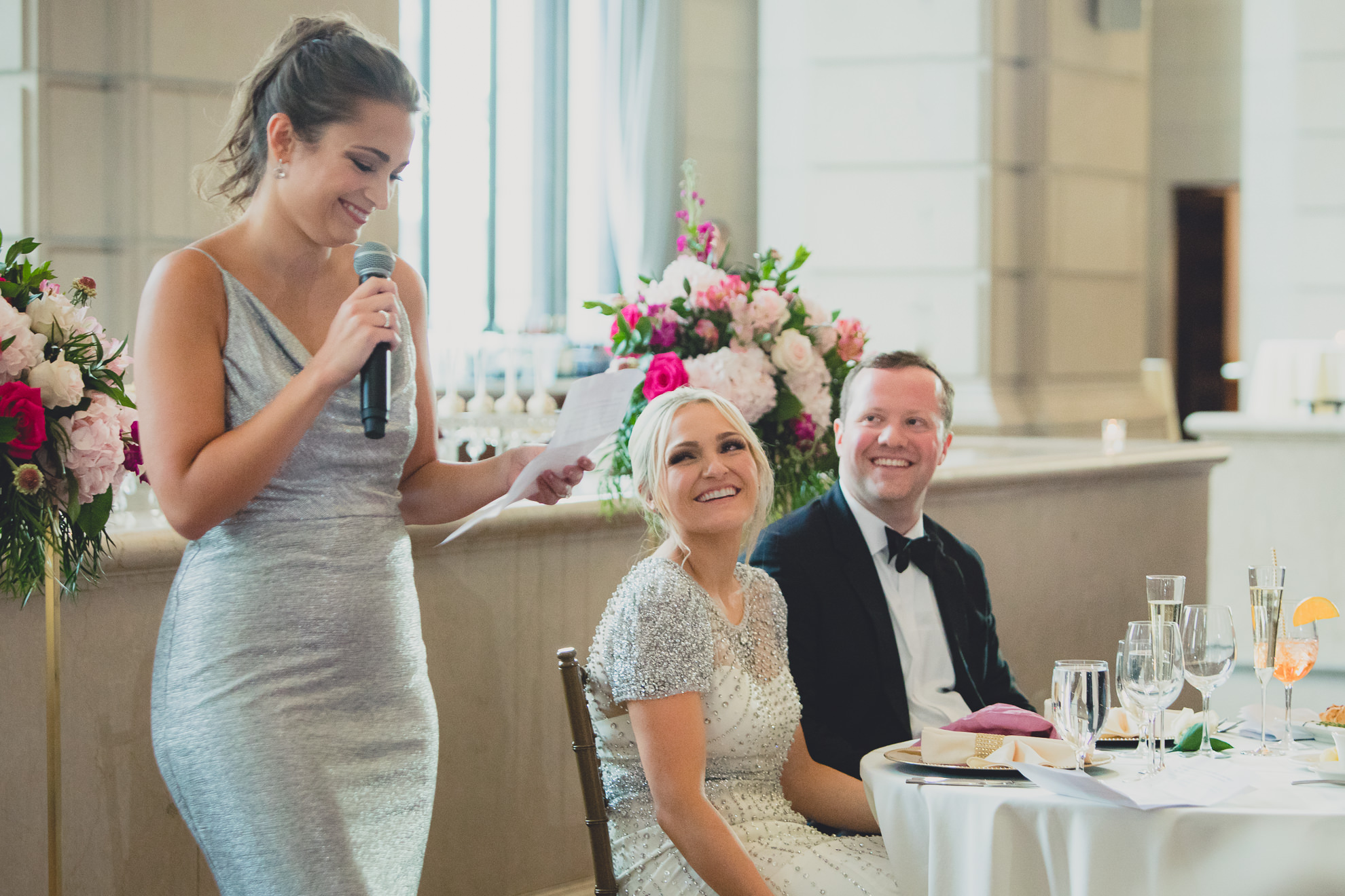 maid of honor delivers speech at Admiral Room Ballroom wedding reception venue in downtown Buffalo, NY
