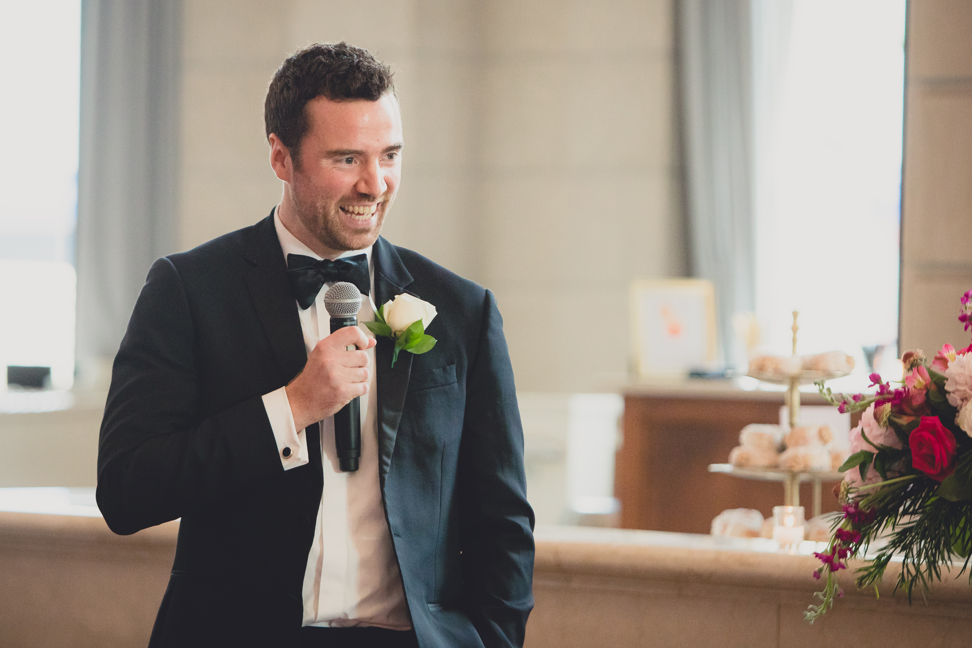 best man delivers speech at Admiral Room Ballroom wedding reception venue in downtown Buffalo, NY