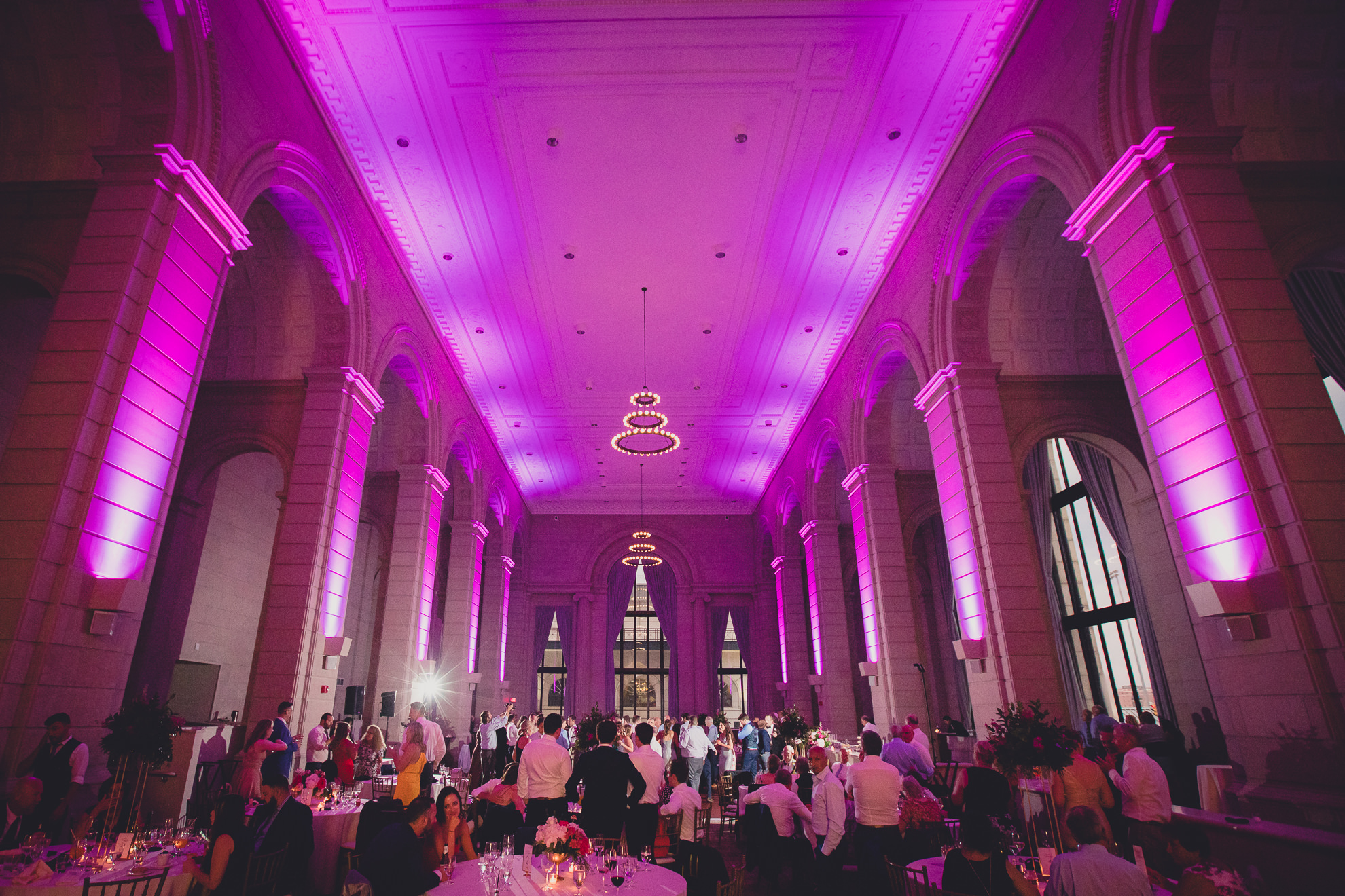 Guests dance in the Admiral Room Ballroom wedding reception venue in downtown Buffalo, NY