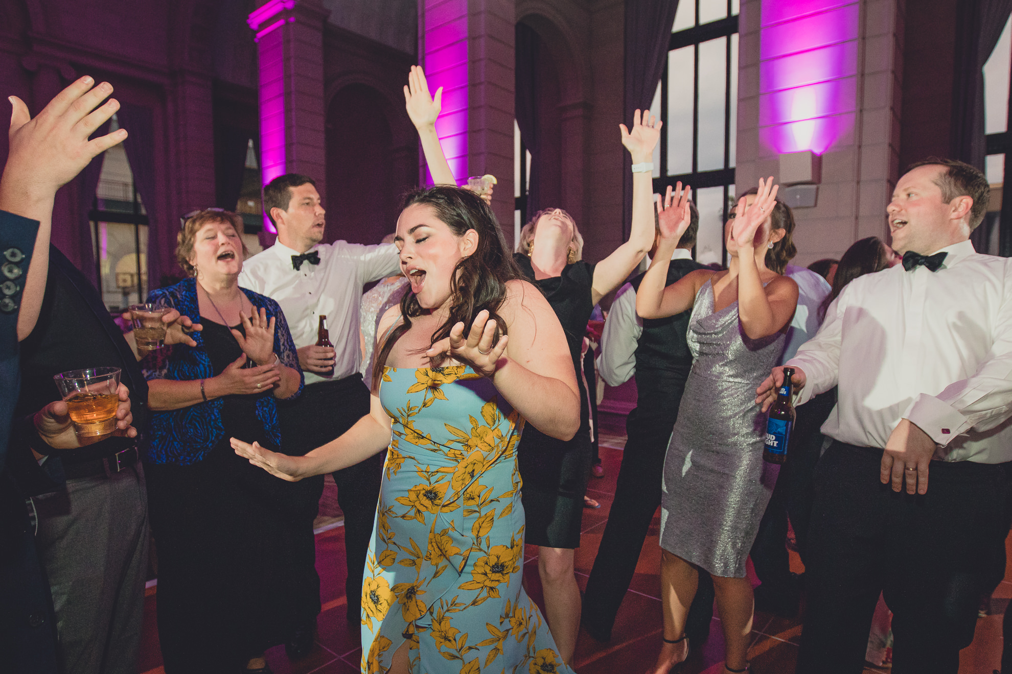 Guests dance in the Admiral Room Ballroom wedding reception venue in downtown Buffalo, NY