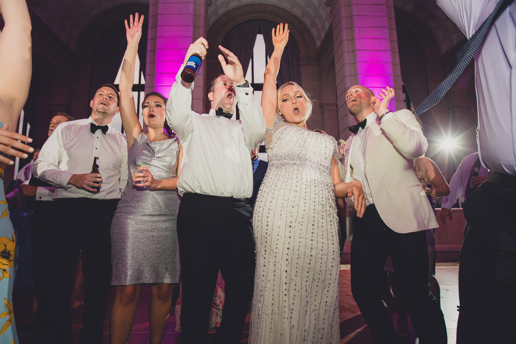 Guests dance in the Admiral Room Ballroom wedding reception venue in downtown Buffalo, NY