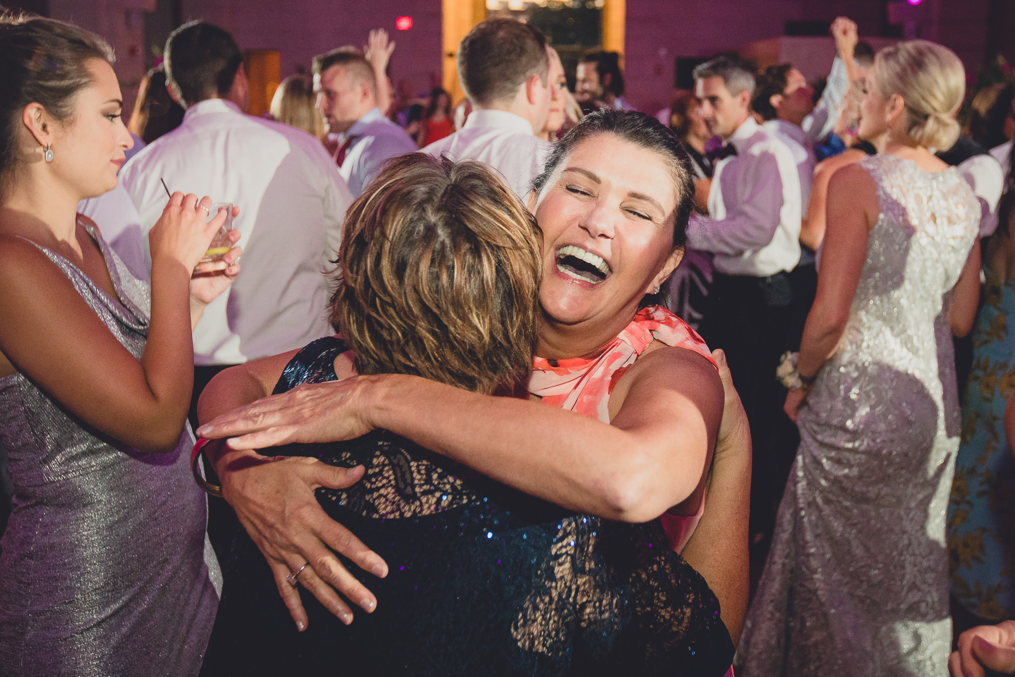 Guests dance in the Admiral Room Ballroom wedding reception venue in downtown Buffalo, NY