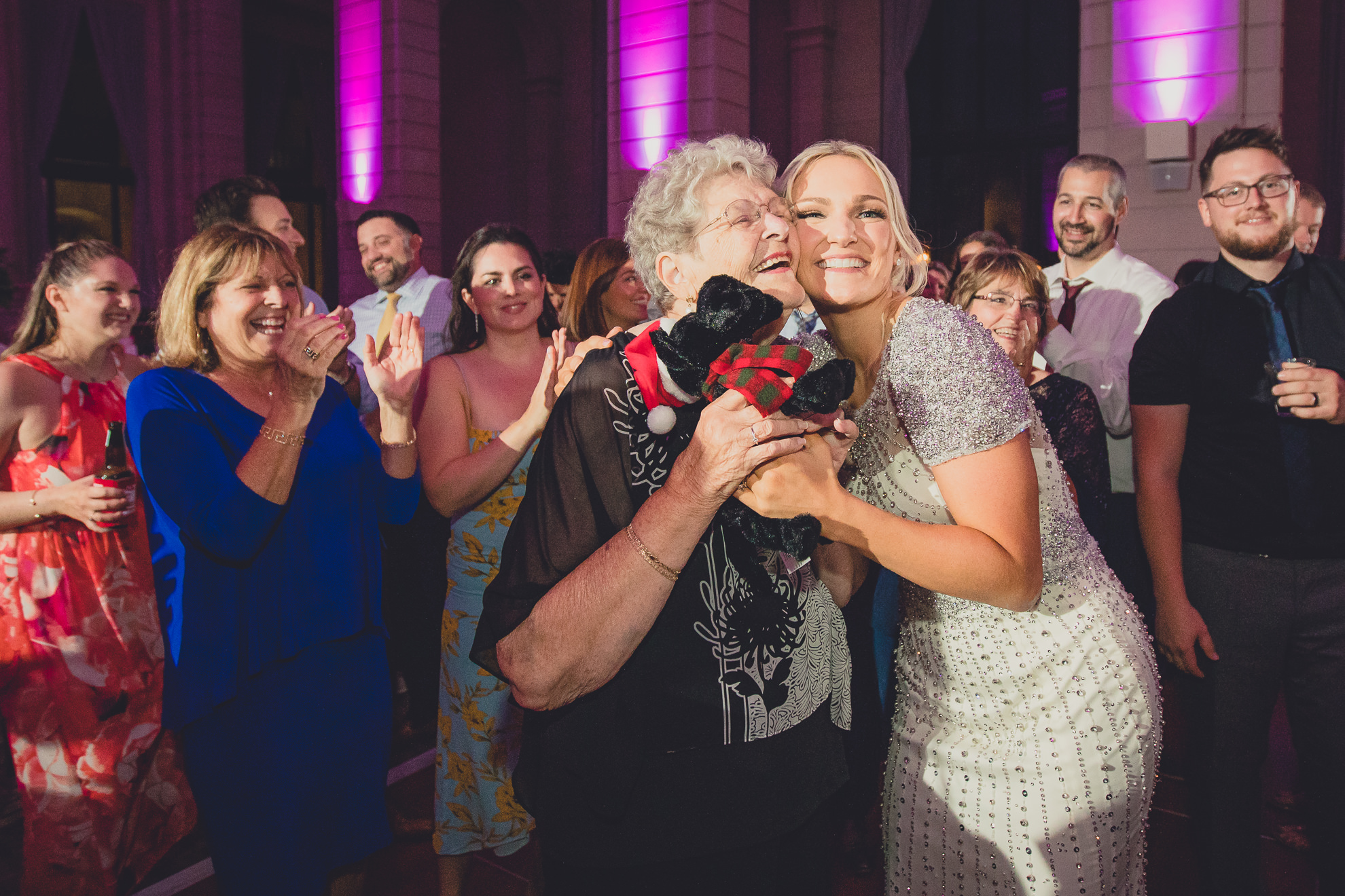 Guests dance in the Admiral Room Ballroom wedding reception venue in downtown Buffalo, NY